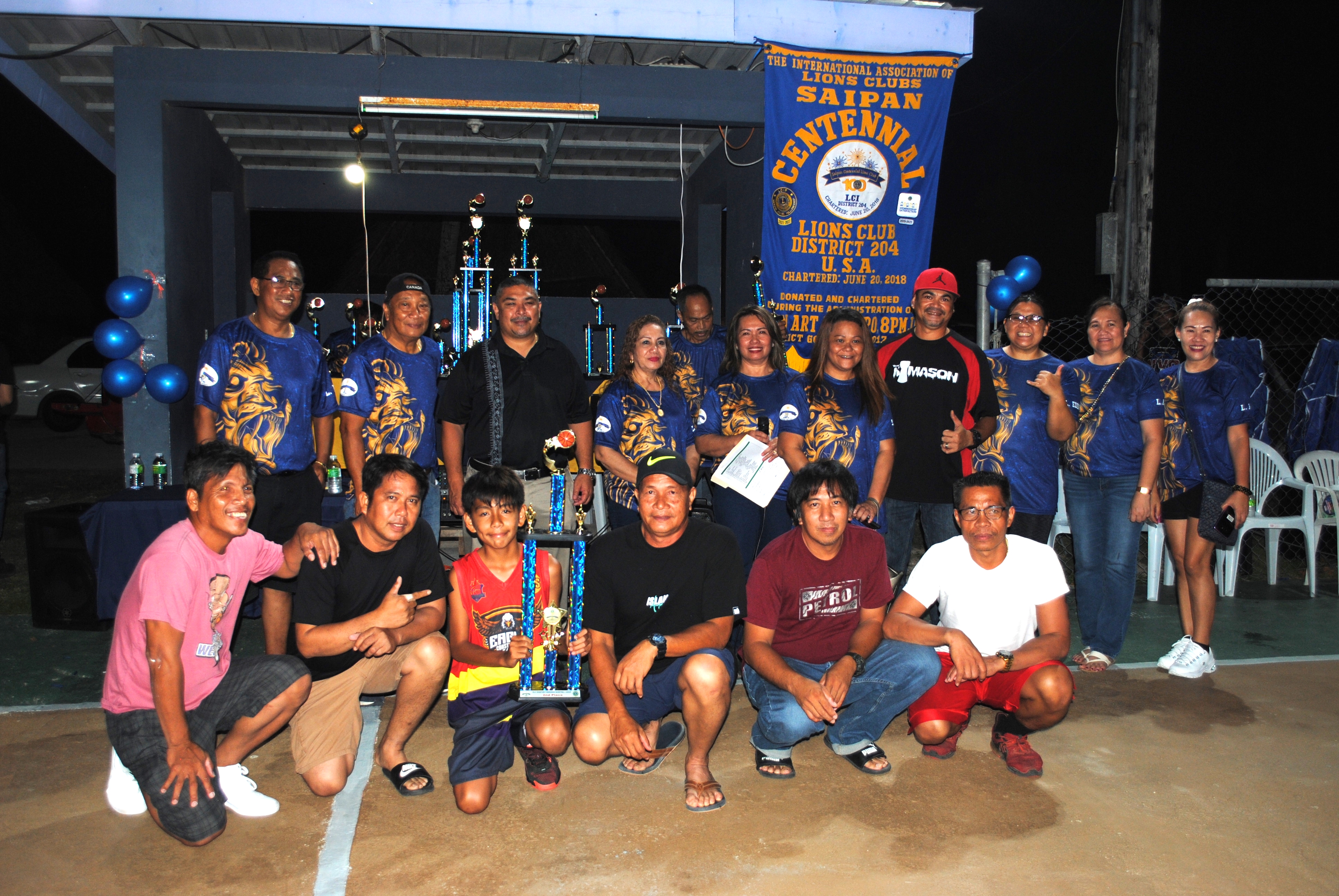 Eagles Construction players pose with their the second-place trophy in the masters division.