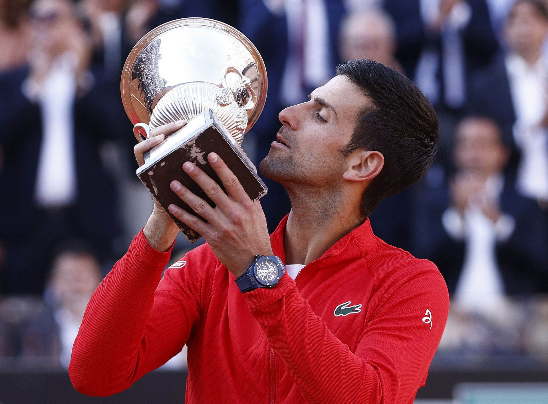 Serbia's Novak Djokovic celebrates with the trophy after winning the Italian Open final against Greece's Stefanos Tsitsipas at Foro Italico, Rome, Italy on May 15, 2022.