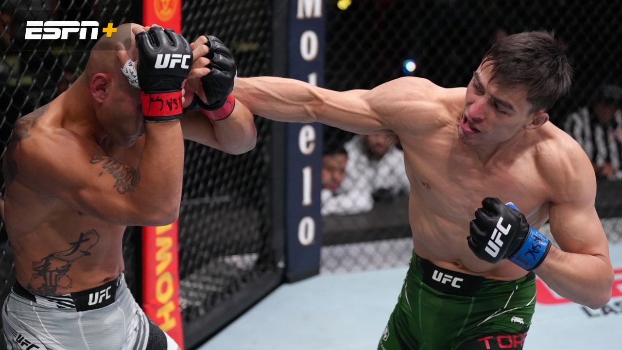 Frank "The Crank" Camacho defends against Manuel "El Loco" Torres during their UFC fight in Las Vegas, Nevada on Saturday.
