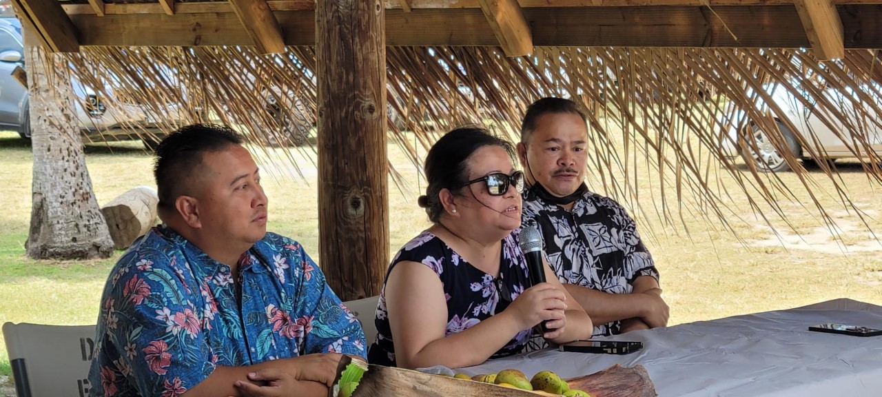 HPO Director Rita Chong, center, delivers her remarks.