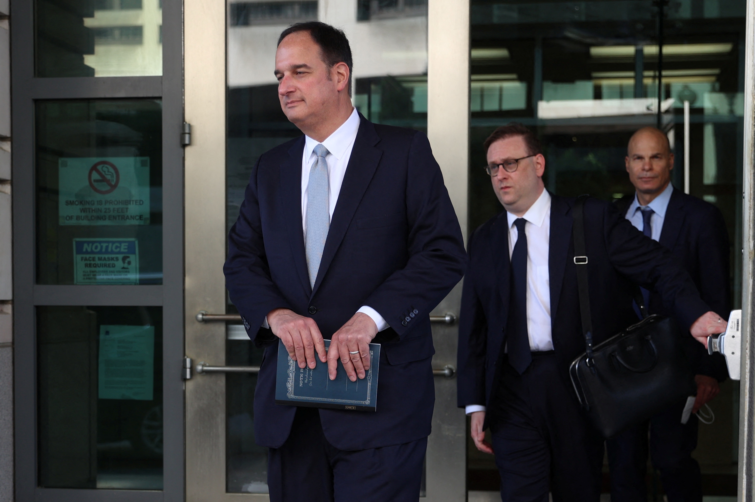 Attorney Michael Sussmann departs the U.S. Federal Courthouse after opening arguments in his trial in Washington, D.C., May 17, 2022. Special Counsel John Durham is prosecuting Sussmann on charges that he lied to the Federal Bureau of Investigation while providing information about  discredited allegations of communications between the 2016 presidential campaign of Donald Trump and Russia.