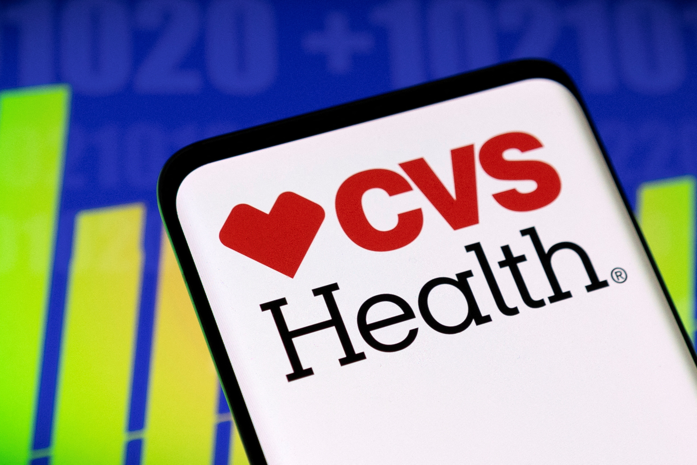 CVS Health logo and stock graph are seen displayed in this illustration taken May 3, 2022.