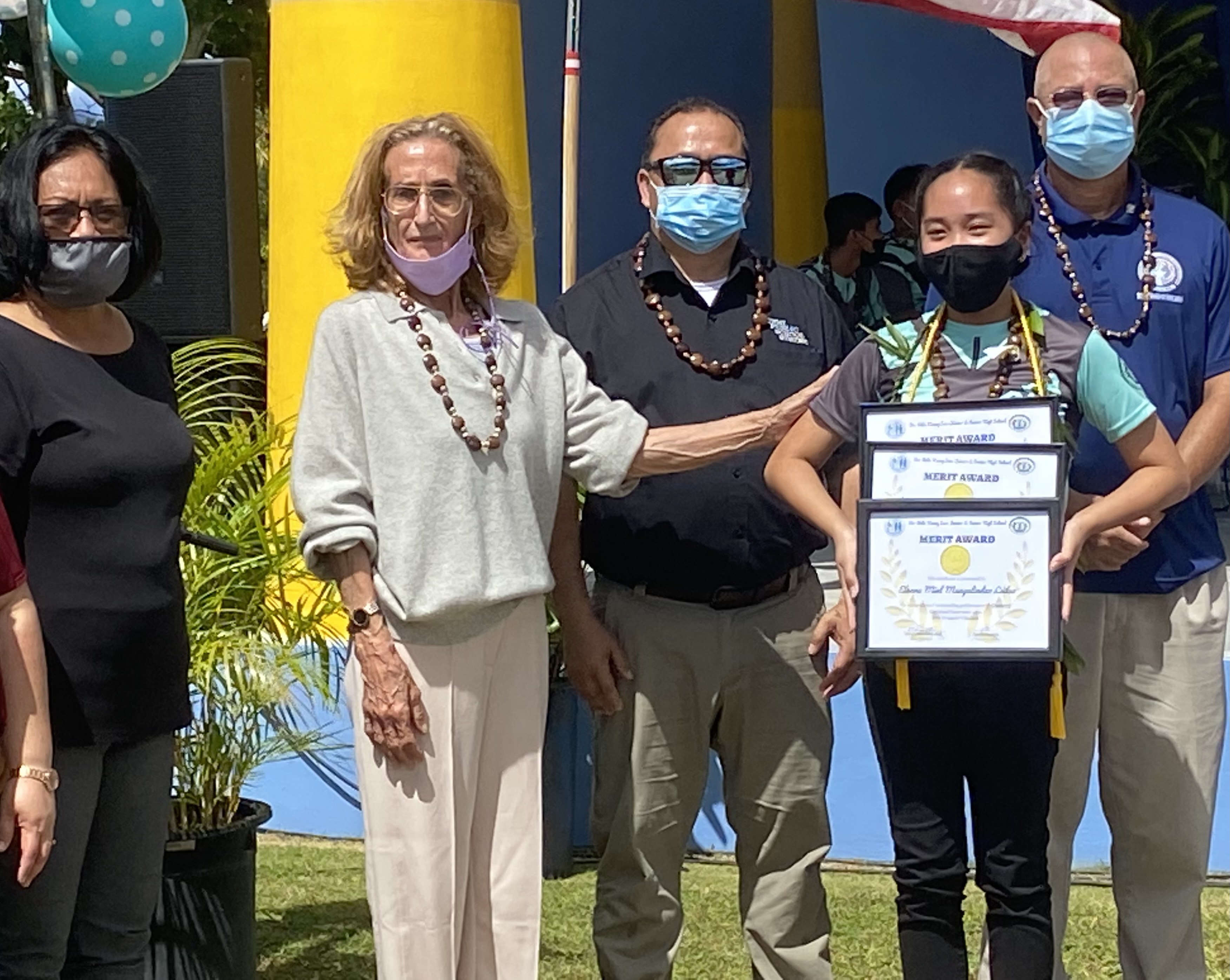 Newly promoted Eianne Miel Mangalindan Ladao receives the subject awards for Chamorro, Computer and Career Exploration-Fine Arts.
