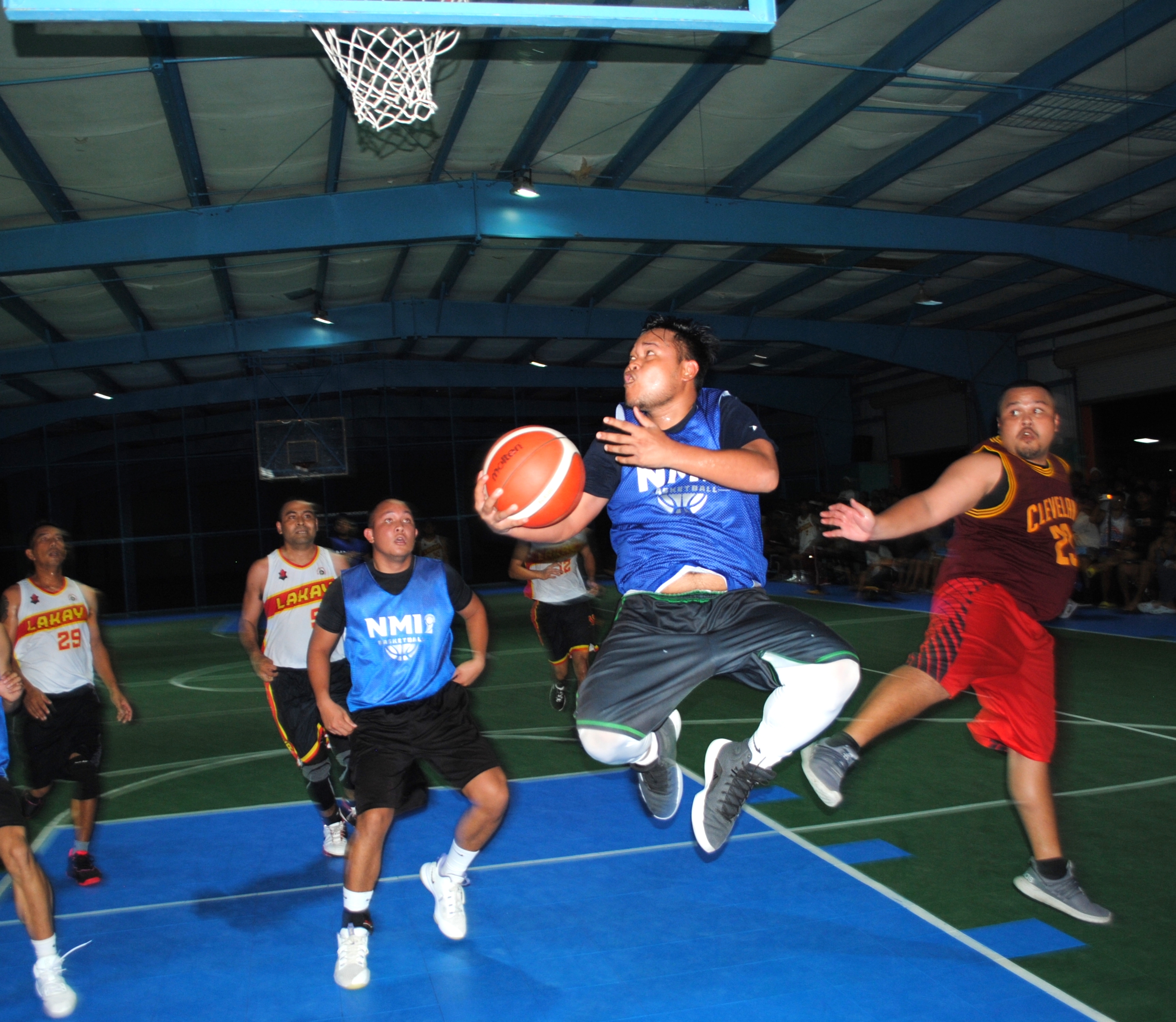 Team Marianas' Aranda attempts the reverse layup.