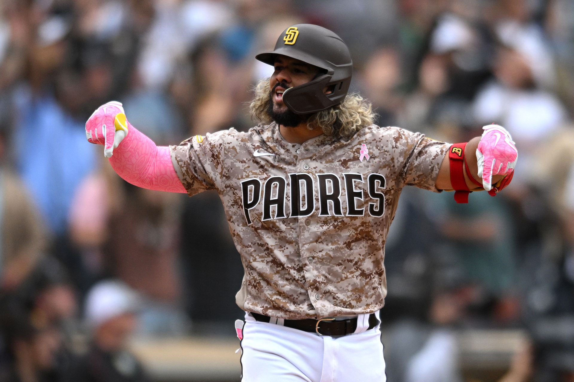 San Diego Padres pinch-hitter Jorge Alfaro (38) gestures after hitting a walk-off three-run home run during the ninth inning against the Miami Marlins at Petco Park in San Diego, California on May 8, 2022.