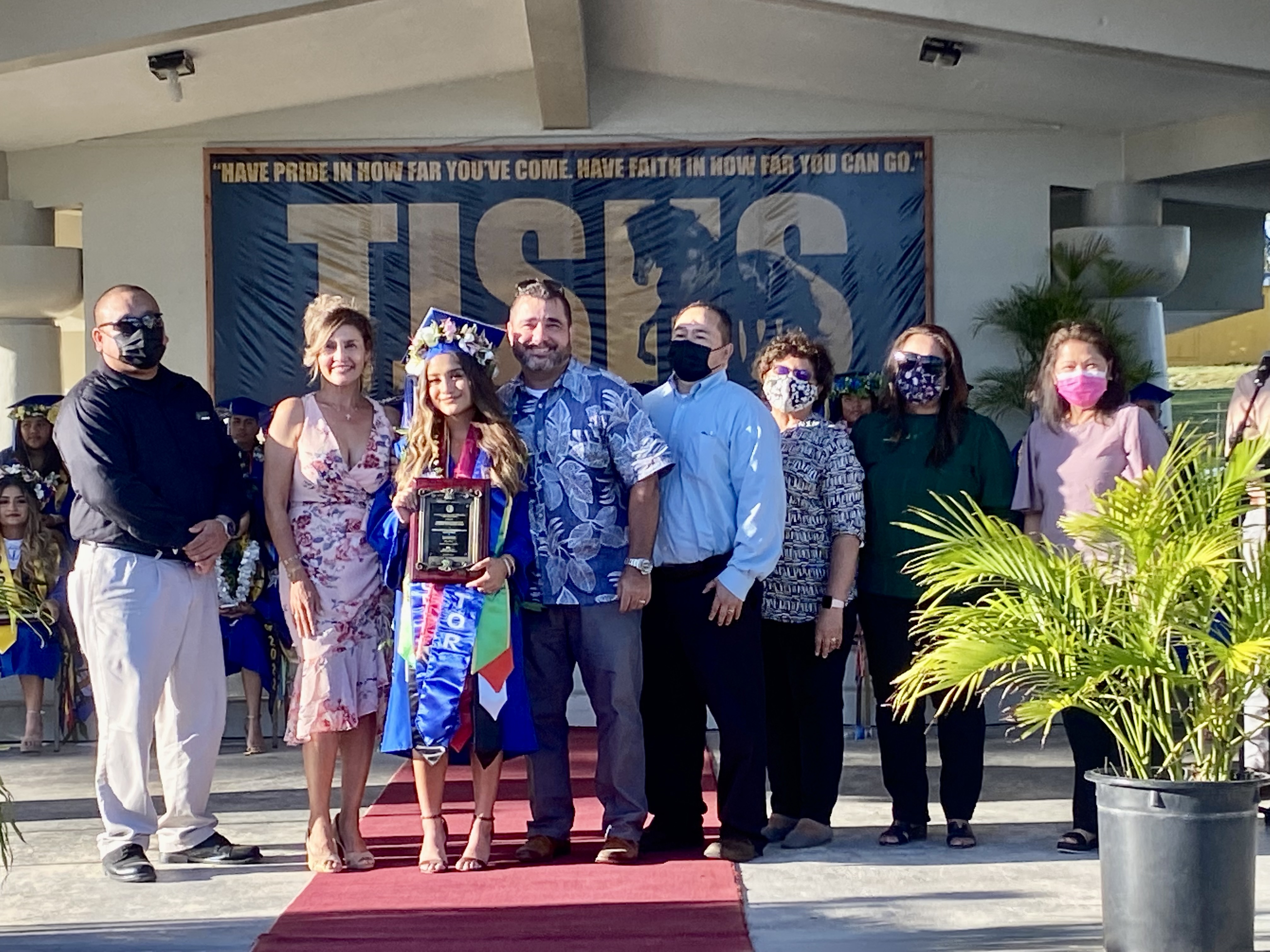 Tinian High School salutatorian Cielo Citlalli Gutierrez Long receives the Commissioner of Education Award from Dr. Alfred B. Ada. Also in photo are Cielo’s parents Arley and Philip Mendiola-Long, Associate Commissioner Eric Magofna, Senior Directors Jackie Quitugua and Yvonne R. Pangelinan, and acting Senior Director Marian Tudela.