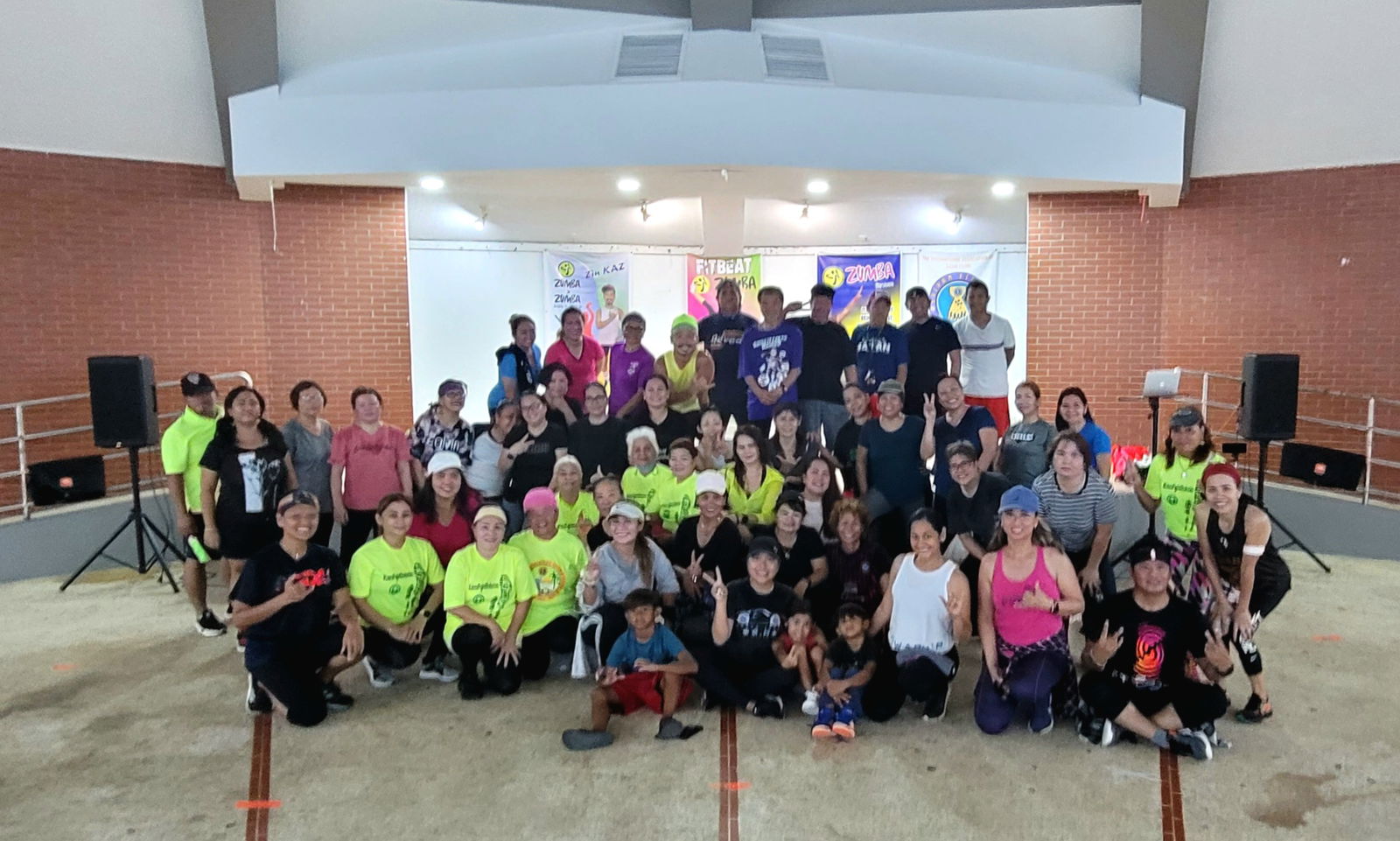 First lady Diann T. Torres poses for a photo with the Zumba group on Tuesday evening at the Garapan Round House.