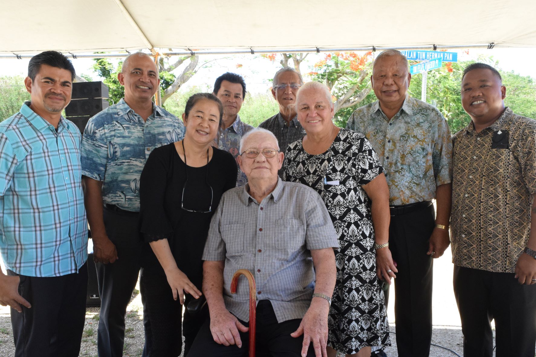 Felipe Ada Roberto and his children with Rep. Roy Ada, Rep. Joseph Flores, Special Assistant to Saipan Mayor Henry Hofschneider, Rep. Joseph Leepan Guerrero, Saipan Mayor David M. Apatang and House Minority Leader Angel Demapan during the unveiling ceremony for the Tun Felipe Roberto Place street name in Dandan.