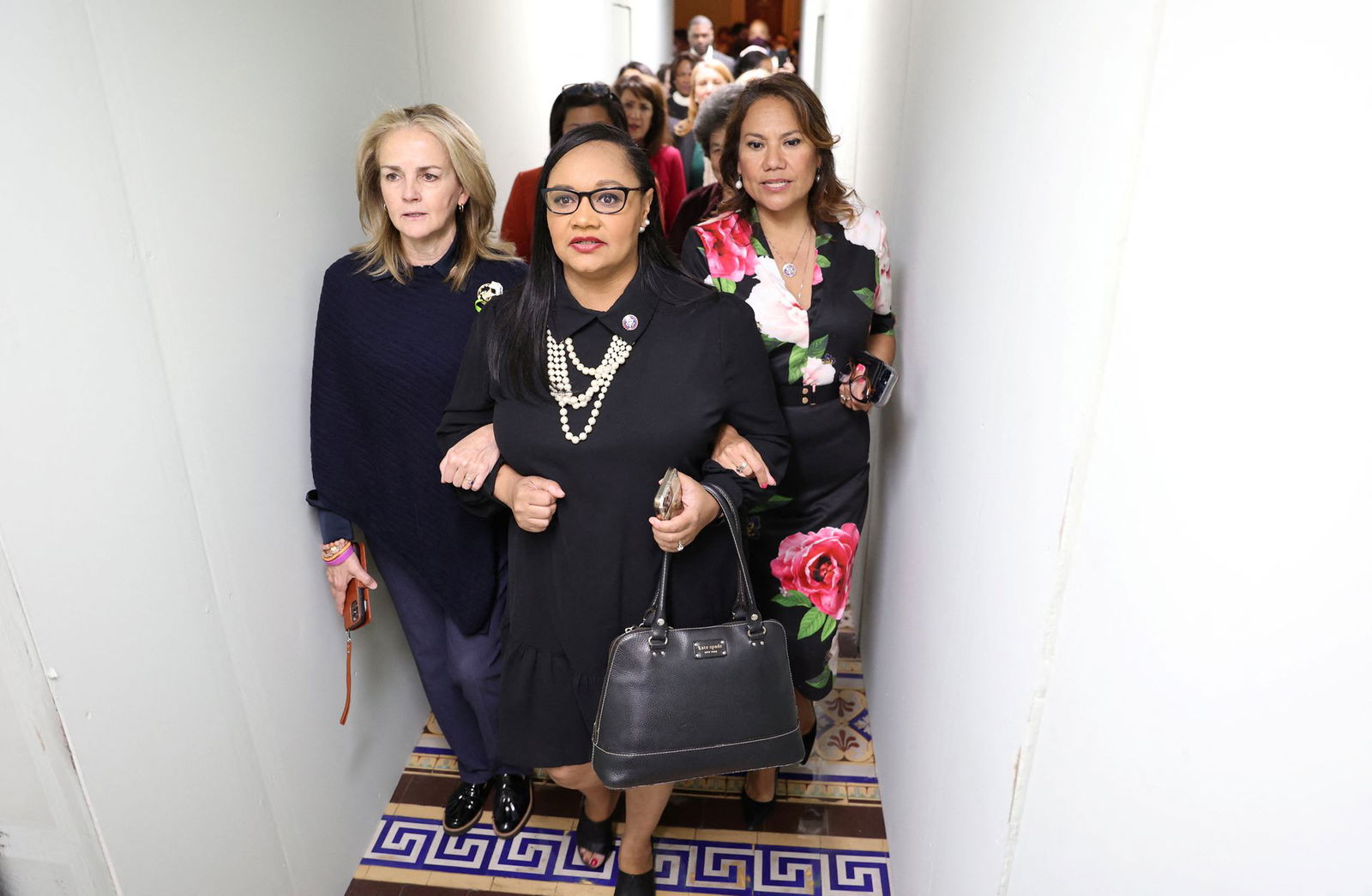 Reps. Madeleine Dean, D-Pa., Nikema Williams, D-Ga., and Veronica Escobar, D-Tx., lead a march of Democratic women members of the U.S. House of Representatives through a tunnel in the U.S. Capitol to gather outside of the U.S. Senate chamber to protest and advocate for abortion rights as the U.S. Senate votes on a bill to codify the U.S. Supreme Court's landmark Roe v. Wade abortion rights decision at the Capitol in Washington, D.C. May 11, 2022.