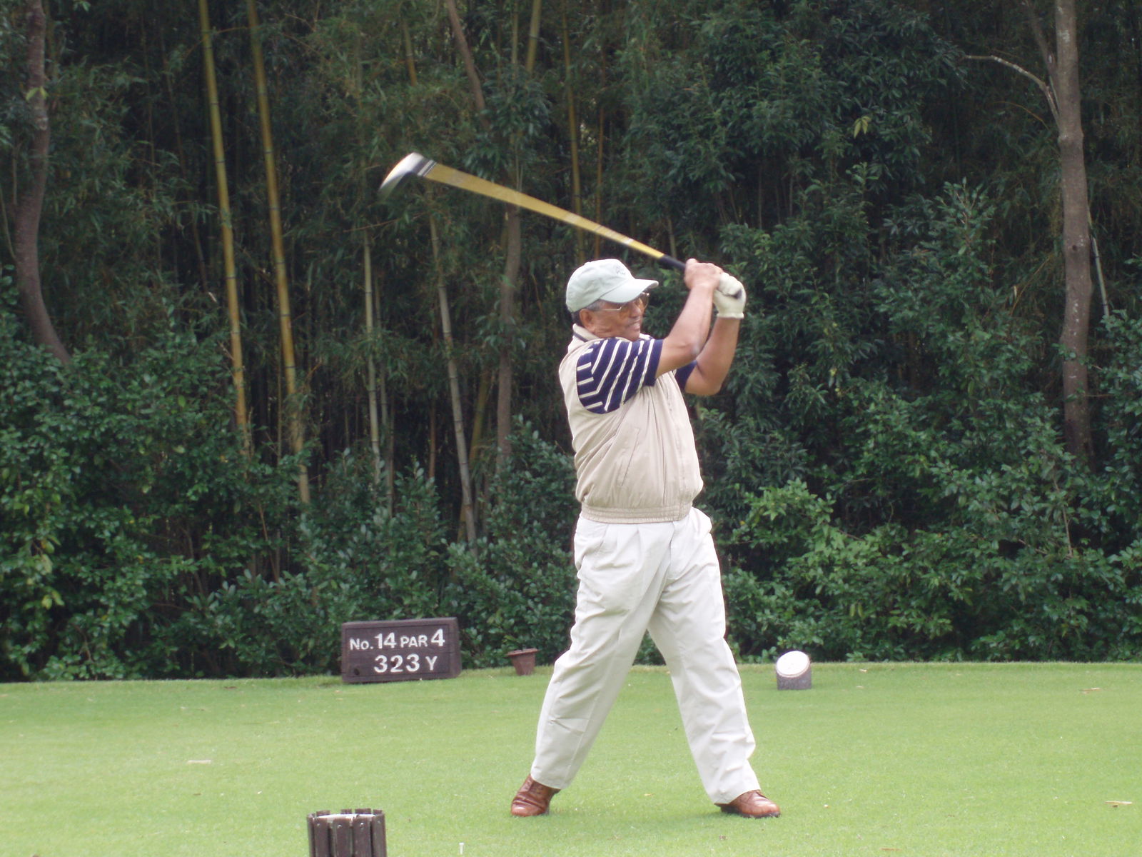 Retired Judge Juan T. Lizama drives another one straight down the middle.