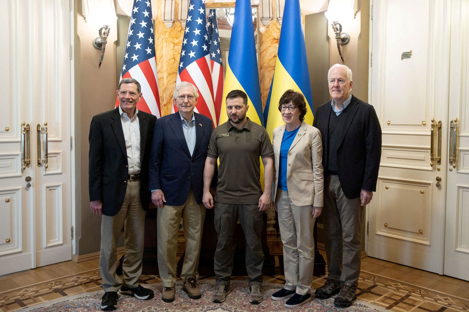 Ukraine's President Volodymyr Zelenskiy poses for a picture with U.S. Senate Minority Leader Mitch McConnell, R-KY, Sens. Susan Collins, R-ME, John Barrasso, R-WY, and John Cornyn, R-TX, before a meeting, as Russia's attack on Ukraine continues, in Kyiv, Ukraine on May 14, 2022.