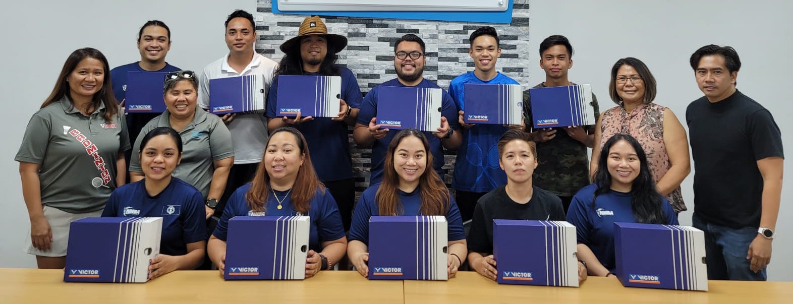 Players and coaches of the NMI Badminton National Team are presented with the competition gear provided by the Pacific Mini Games Organizing Committee to the squad for the 2022 Northern Marianas Pacific Mini Games.  Joining them in the presentation held early this month are the officers of the Northern Marianas Badminton Association.