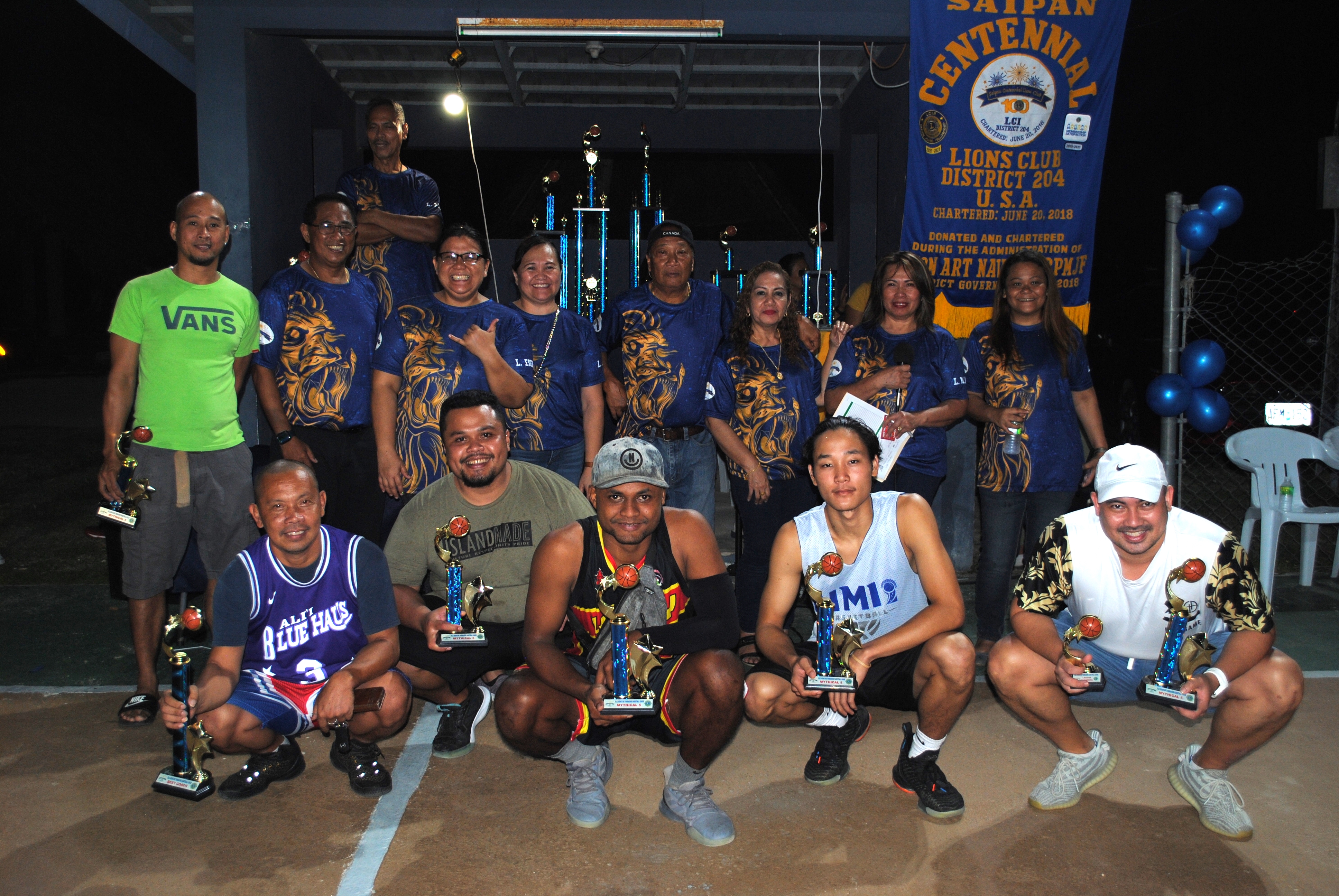 The Mythical 5 pose for a photo.