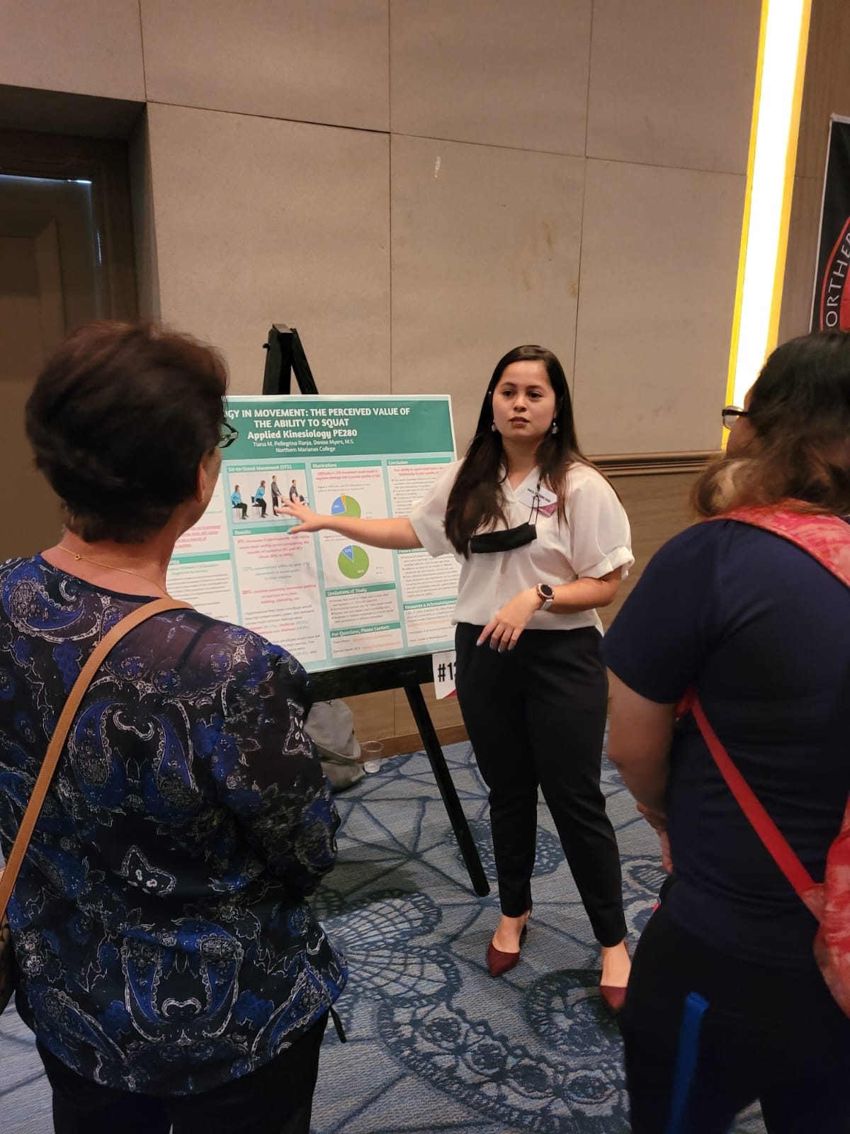 Former NMC student Tiana Pellegrino Ranjo talks about kinesiology during Northern Marianas College's 2nd Research Symposium in the Royal Taga Hall of Saipan World Resort on Friday.