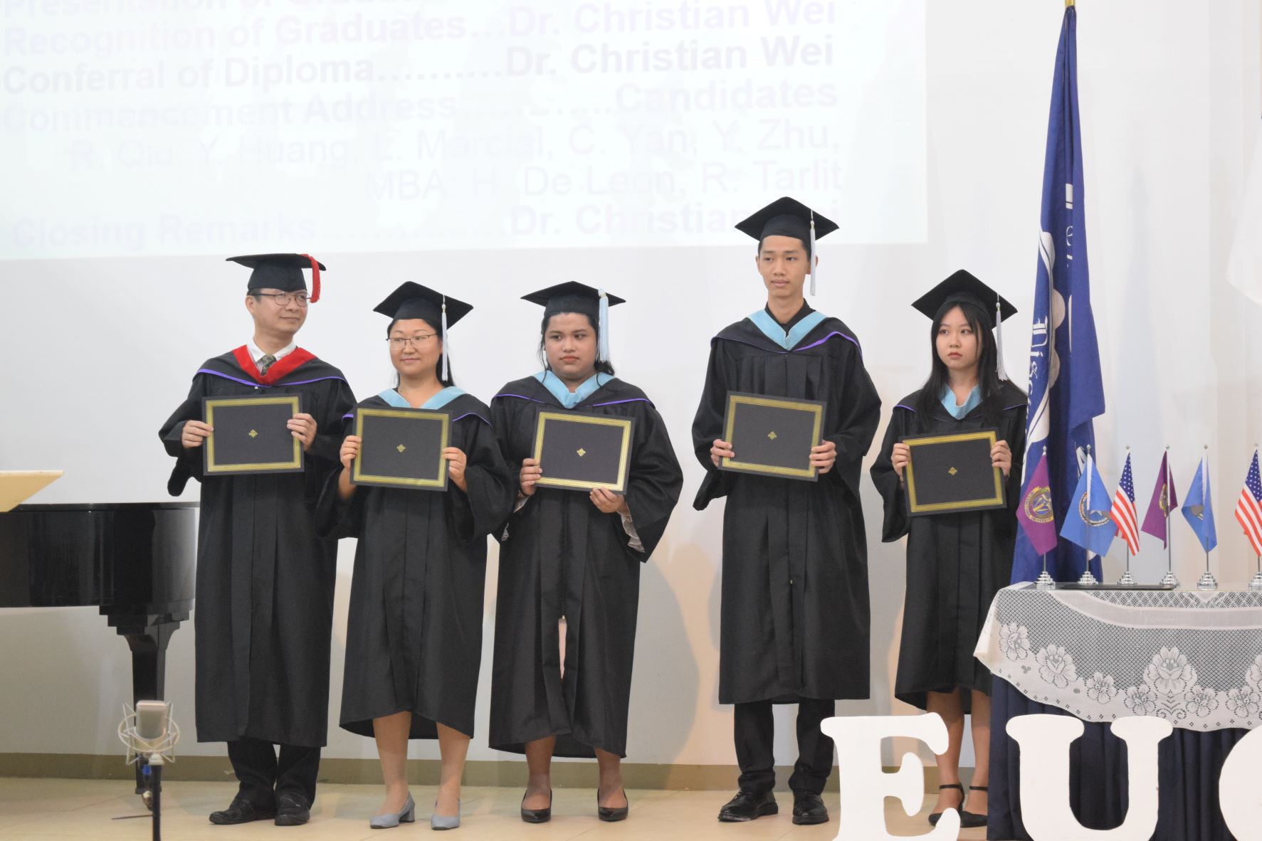 From left, Bachelor of Arts in Bible graduate Ren Quiang Qui, Bachelor of Science in Education graduates Ying "Heidi" Huang, Lea Marcial, Caleb "Joshua" Yan and Yi Jin Zhu.
