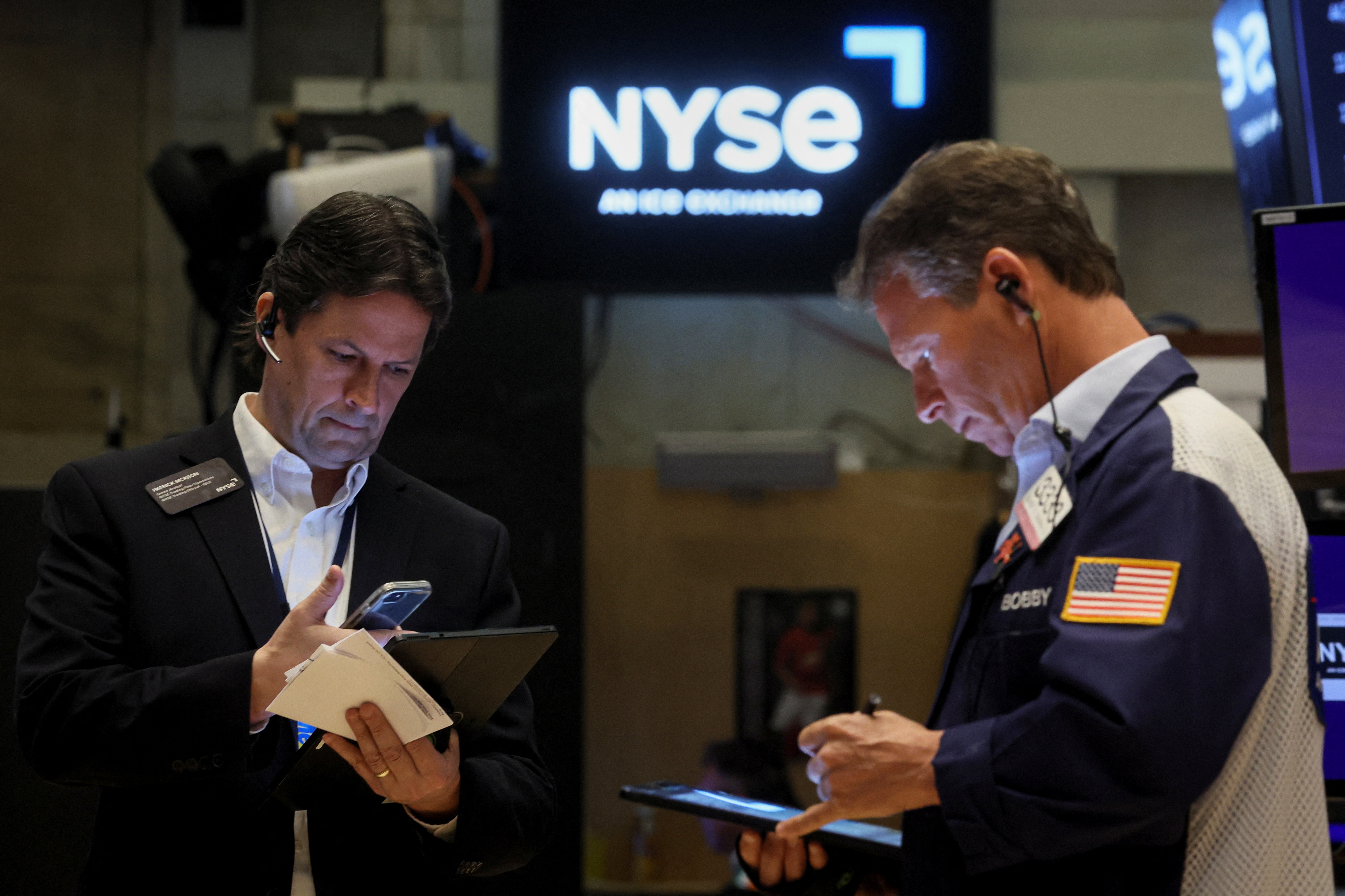 Traders work on the floor of the New York Stock Exchange on May 4, 2022.