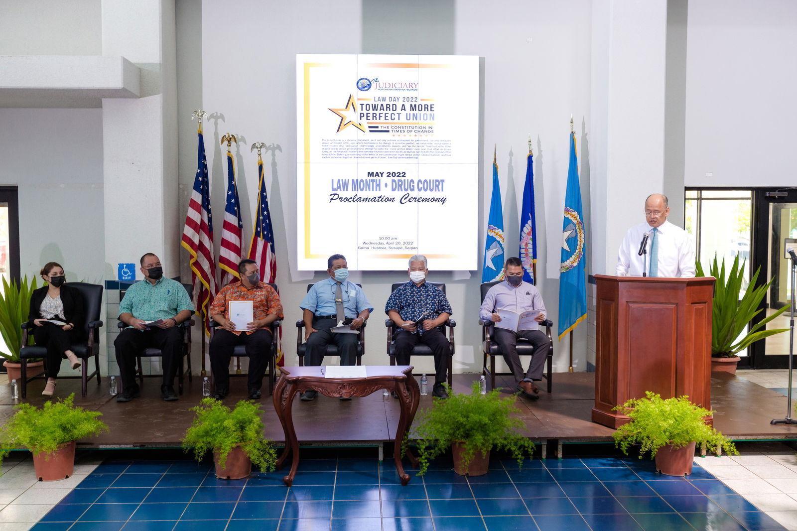 Justice John Manglona, right, delivers the opening remarks during the Law Day proclamation signing ceremony. Also in photo, from left, seated: NMI Bar Association President Charity Hodson, House Speaker Edmund Villagomez, Gov. Ralph DLG Torres, Chief Justice Alexandro Castro, Lt. Gov. Arnold I. Palacios and Senate Floor Leader Vinnie F. Sablan.