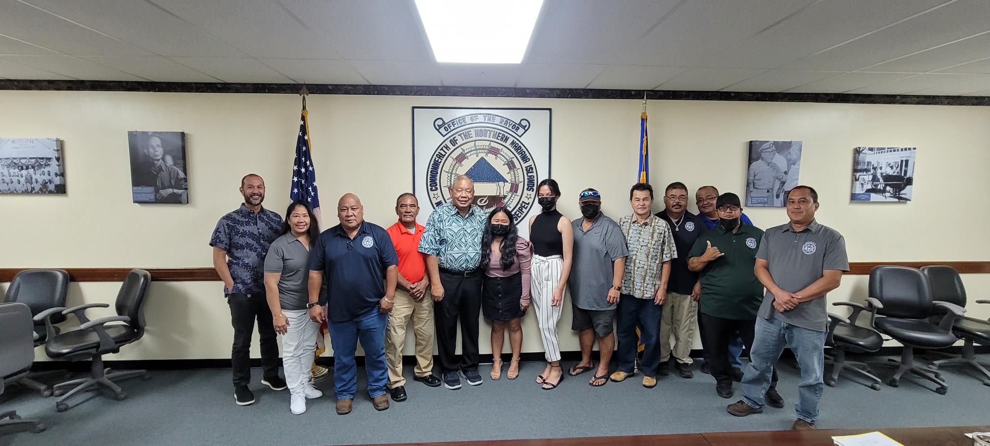 The 2022 Liberation Day committee members pose for a photo in the Saipan mayor's conference room on Wednesday.