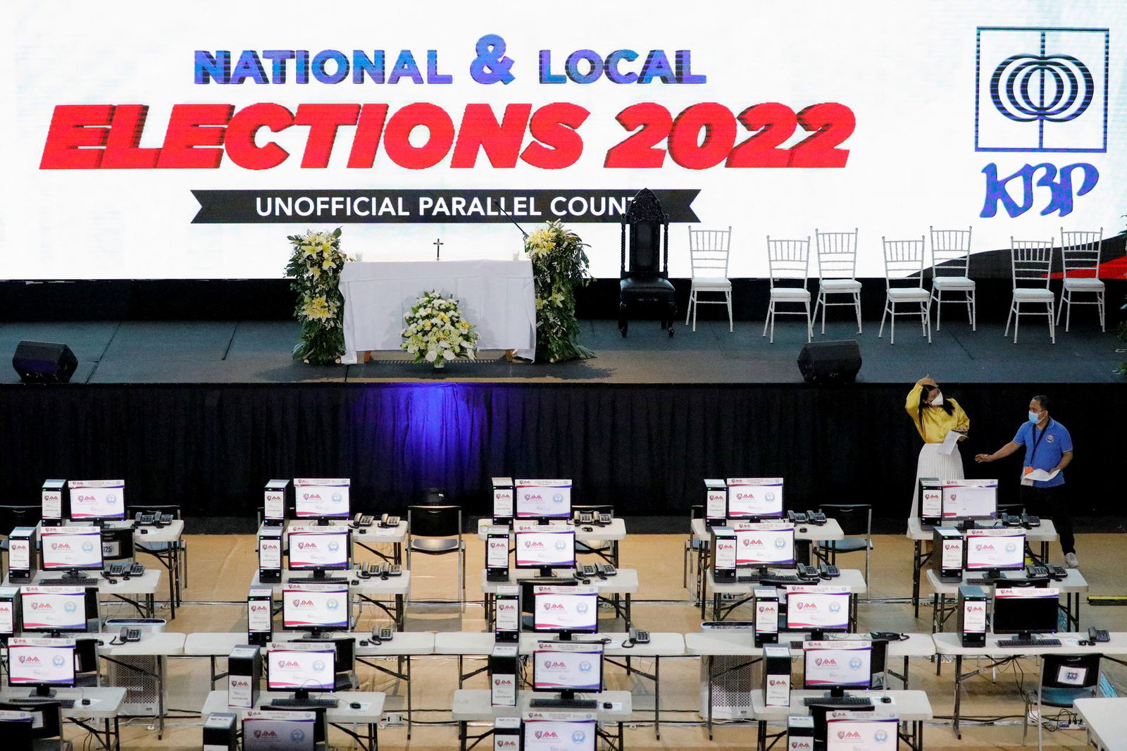 Staff members prepare for the national elections at the Parish Pastoral Council for Responsible Voting, a command center of the election watchdog, a day prior to the elections in Manila, the Philippines, May 8, 2022.