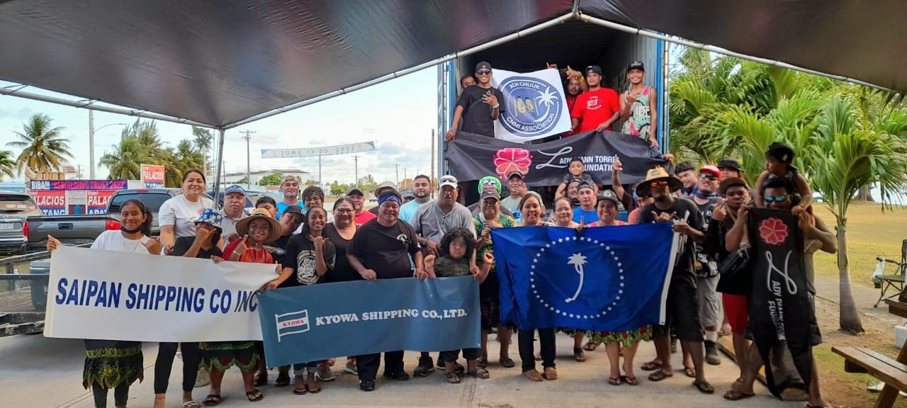 Members of the Ach Chuuk CNMI Association pose for a photo with community partners.