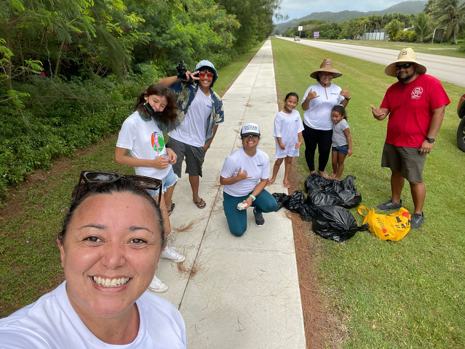 Rep. Leila Staffler takes a selfie with some of the Precinct 5 volunteers who helped with the Earth Day Trash Drop-Off on Saturday, April 23, 2022.