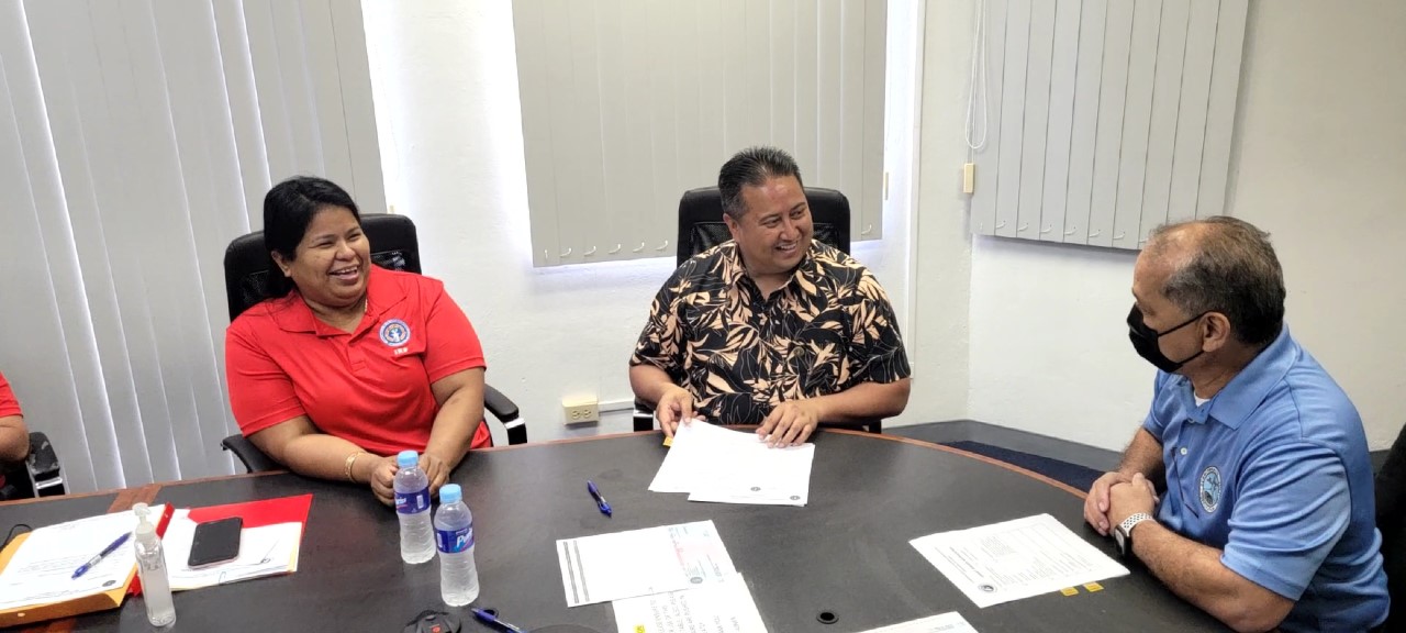 From left, Infrastructure and Recovery Program coordinator Marianne Concepcion-Teregeyo, Gov. Ralph DLG Torres, and CUC Executive Director Gary Camacho share a laugh as they converse on Friday.