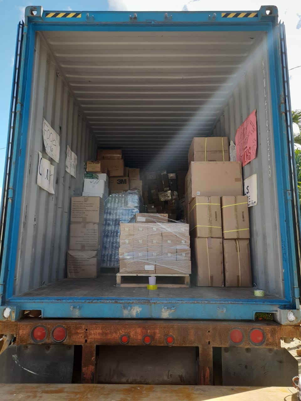 A container is filled with aid items for Chuuk residents.