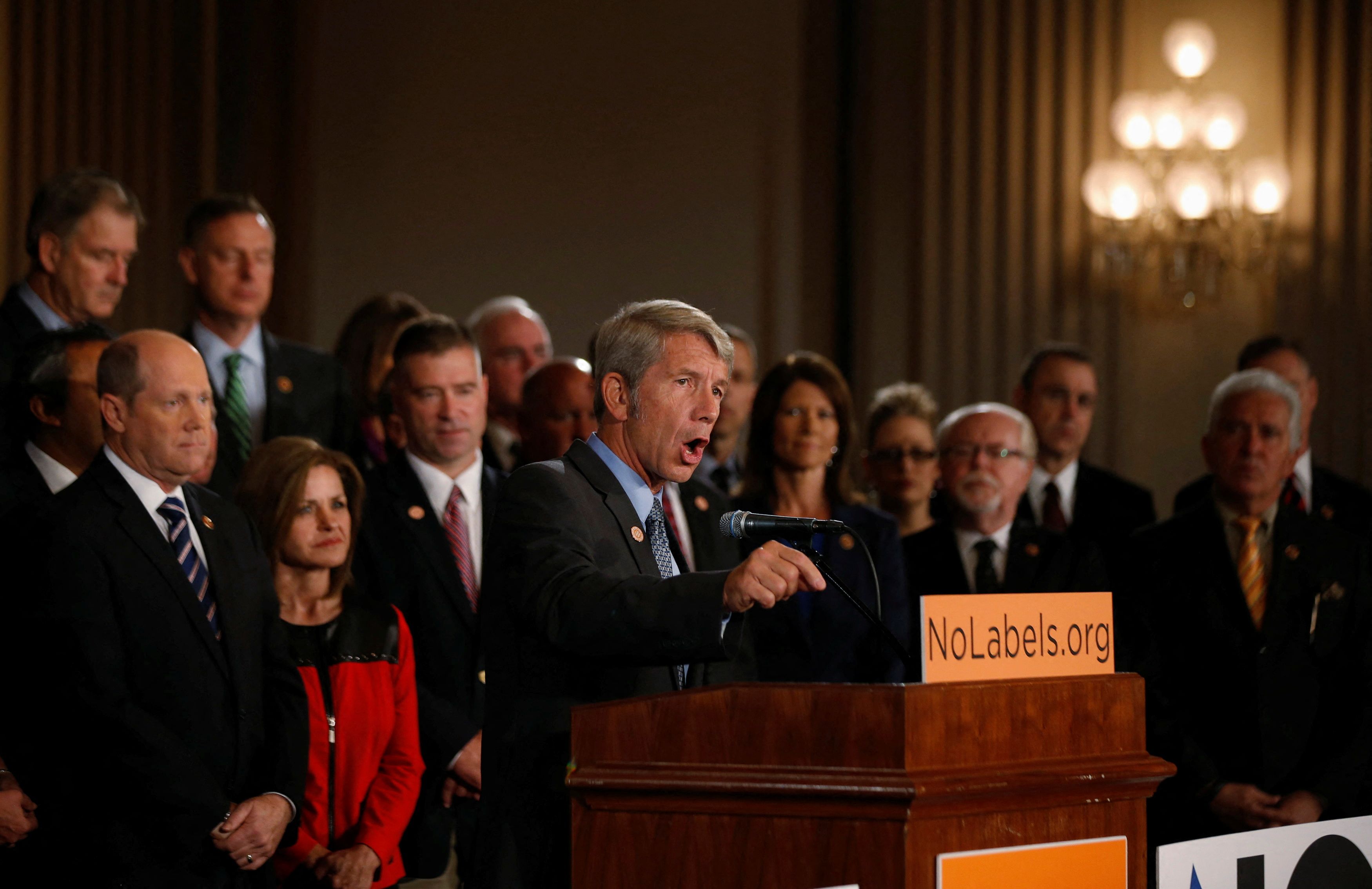 U.S. Rep. Kurt Schrader, D-Or., delivers remarks alongside Rep. Reid Ribble, R-Wi., left, on behalf of No Labels, a group of Republican and Democrat congressmen calling for a solution to end the U.S. government shut down on Capitol Hill in Washington, D.C. Oct. 10, 2013.