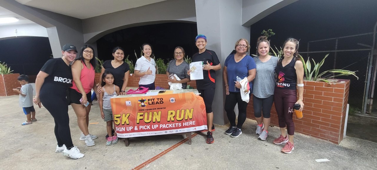 CHCC CEO Esther Muna, third right, poses for a photo with CHCC staff and Fit-to-Lead representatives.