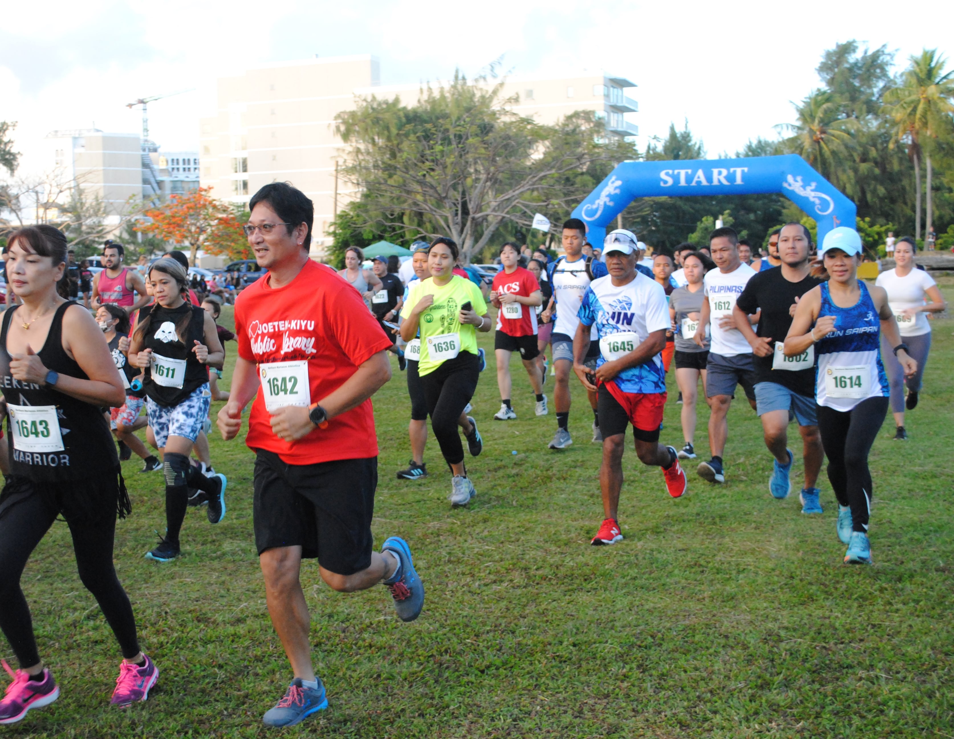 Participants take off at the start of the 2nd CNMI Star Wars Day Run on Saturday at American Memorial Park.