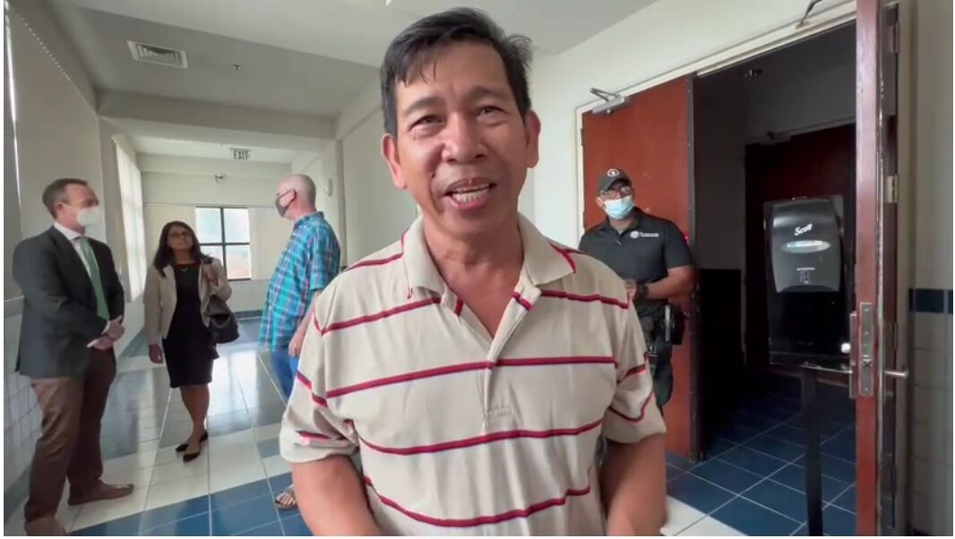 Eduardo Fabia, 50, speaks to reporters after jurors on Friday acquitted him of all charges in connection with a fatal vehicle crash at the Puerto Rico intersection on Feb. 1, 2021. Behind him are Assistant Public Defenders Jean Pierre Nogues and Vina Seelam.