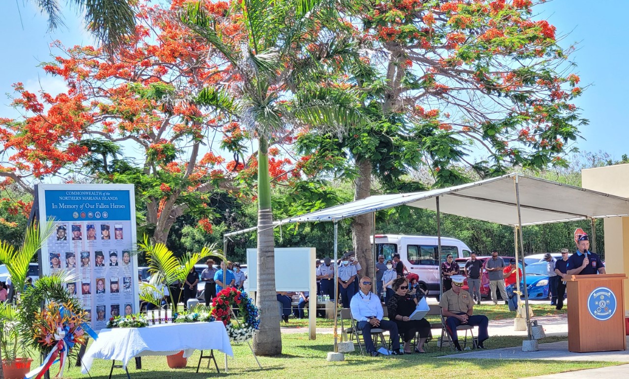 Veterans of Foreign Wars Department of Pacific Affairs District 6 Commander Brad Ruszala reads the Roll Call of Fallen Comrades.