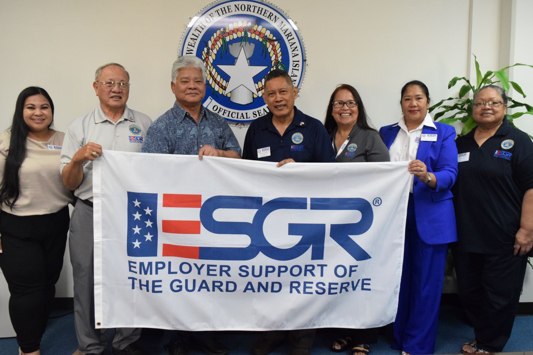 Lt. Gov. Arnold I. Palacios, third left, poses for a photo with Employer Support of the Guard and Reserve Guam-CNMI state chairman, Ret. Lt. Col. Rey Llaneta, center, vice chair, Ret. Maj. Gen. Benny Paulino, second left,  volunteer support technician Angel D. Vibar, left, Guam-CNMI area chair, Rita A. Sablan, Ed.D. third right. ombudsman Joann Aquino, second right, and employer outreach coordinator Rose Igitol during a leadership meeting on Wednesday in the lt. governor's office on Capital Hill.