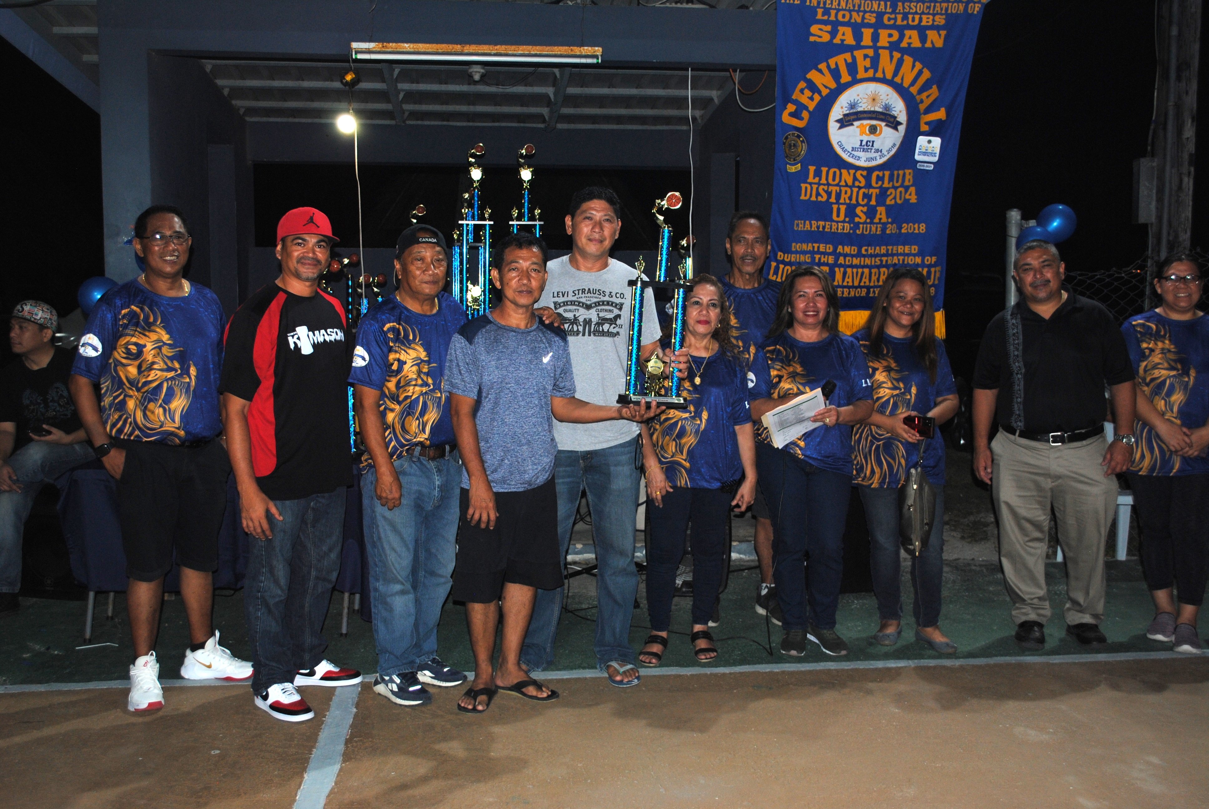 NAPA players pose with their third-place trophy in the masters division.