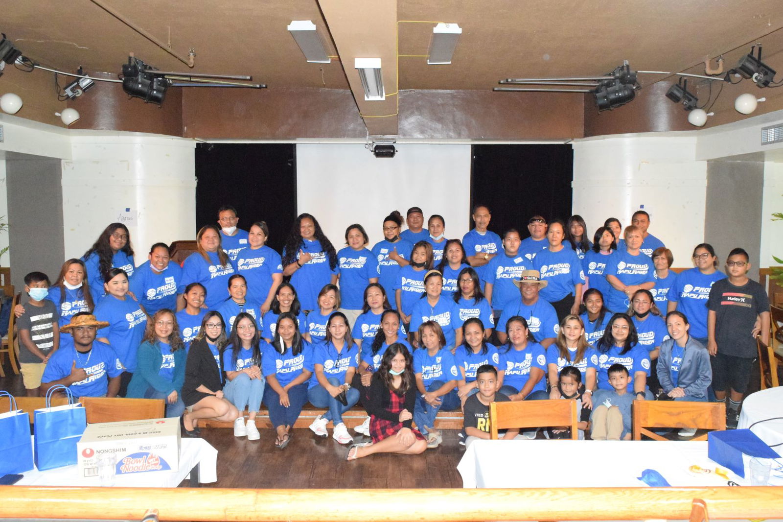 Francisco M. Sablan Middle School Principal Cherlyn Cabrera Osung poses for a photo teachers and parents during the FMS Parent-Teacher Summit at Charley’s Cabaret of the Pacific Islands Club on Saturday.
