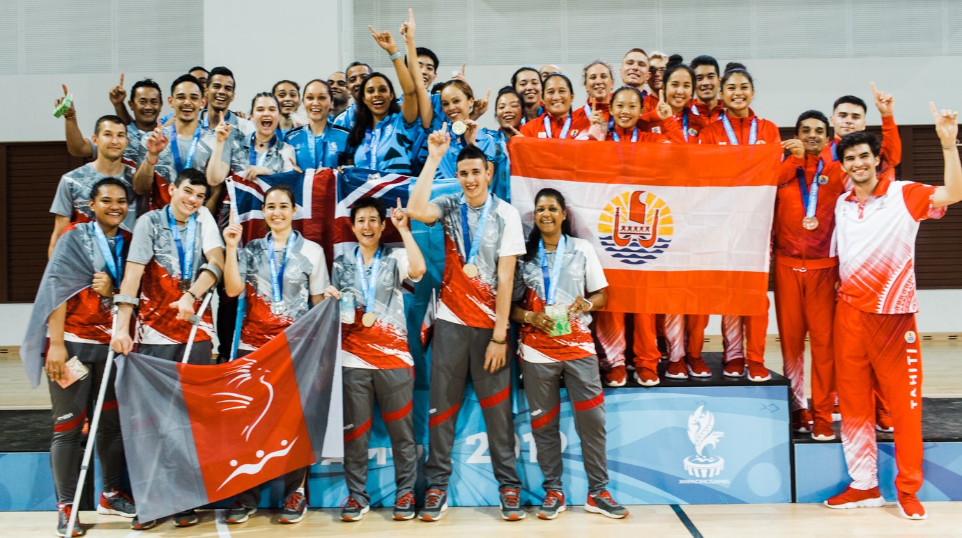 From left, New Caledonia, Fiji, and Tahiti players pose for a photo at the medal ceremony for the mixed team event in the 2019 Pacific Games in Apia. New Caledonia and Tahiti will be the Top 2 seeds in the mixed team event in the 2022 Northern Marianas Pacific Mini Games.