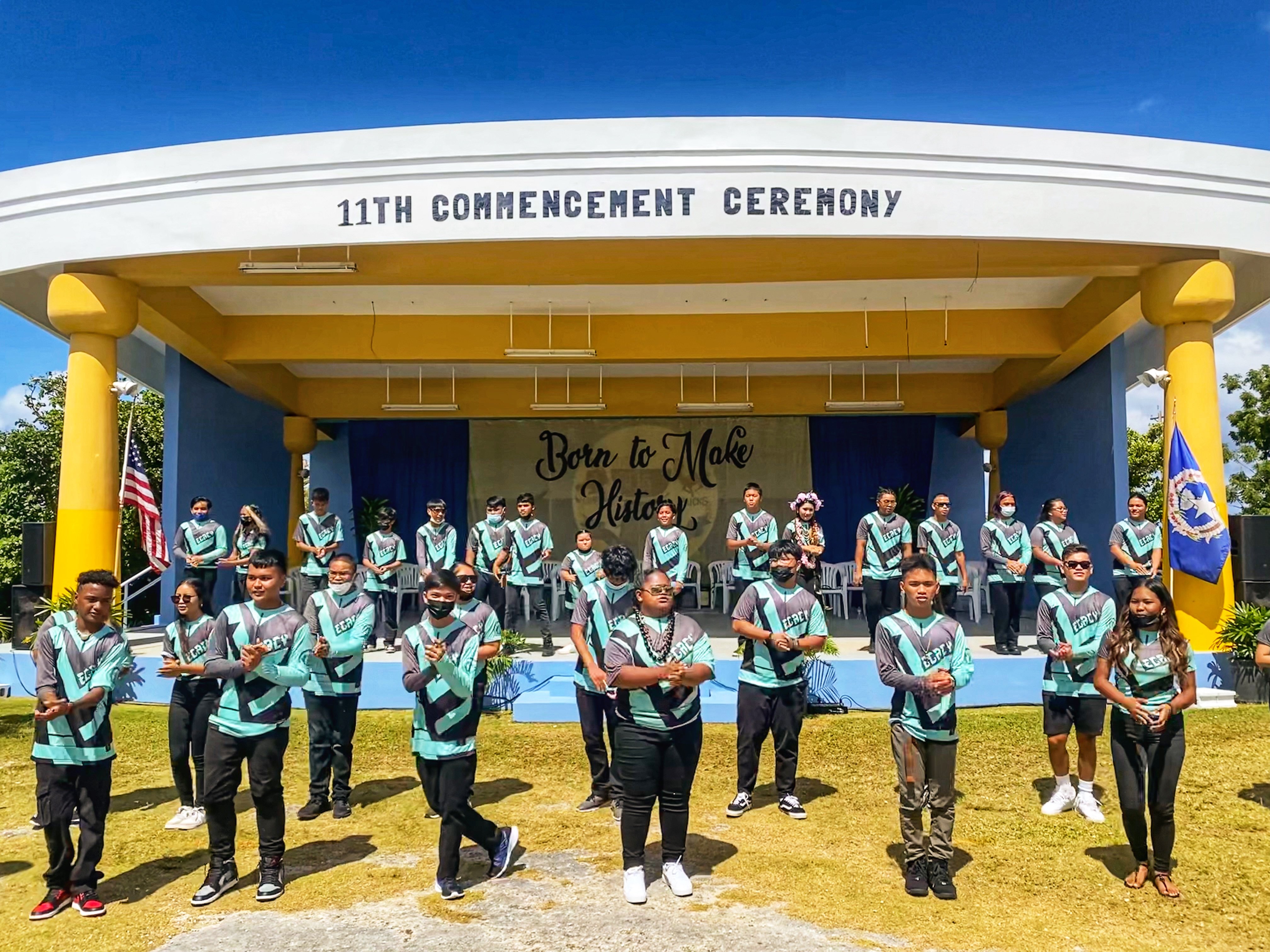 The 35 promoted eighth graders of Dr. Rita Hocog Inos Junior High School on Rota  perform their promotion song.