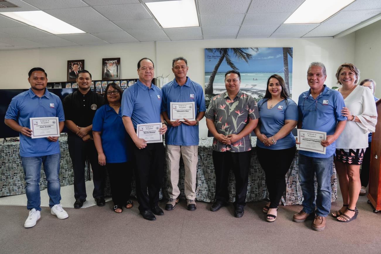 Marianas Visitors Authority employees are recognized on May 5, 2022, at the MVA office in San Jose, Saipan, during Public Service Recognition Week.   From left, MVA Community Projects Coordinator Jack Aranda, Civil Service Commission Chairperson  Jake  Maratita,  Office  of  Personnel  Manager  Frances  Salas,   MVA Leadership Award recipient Martin Duenas, MVA Employee of the Year Ed Diaz, Gov. Ralph DLG Torres, MVA Managing Director Priscilla M. Iakopo, MVA Community Projects Coordinator Ray Villagomez, and MVA Board Vice Chairwoman Gloria Cavanagh.