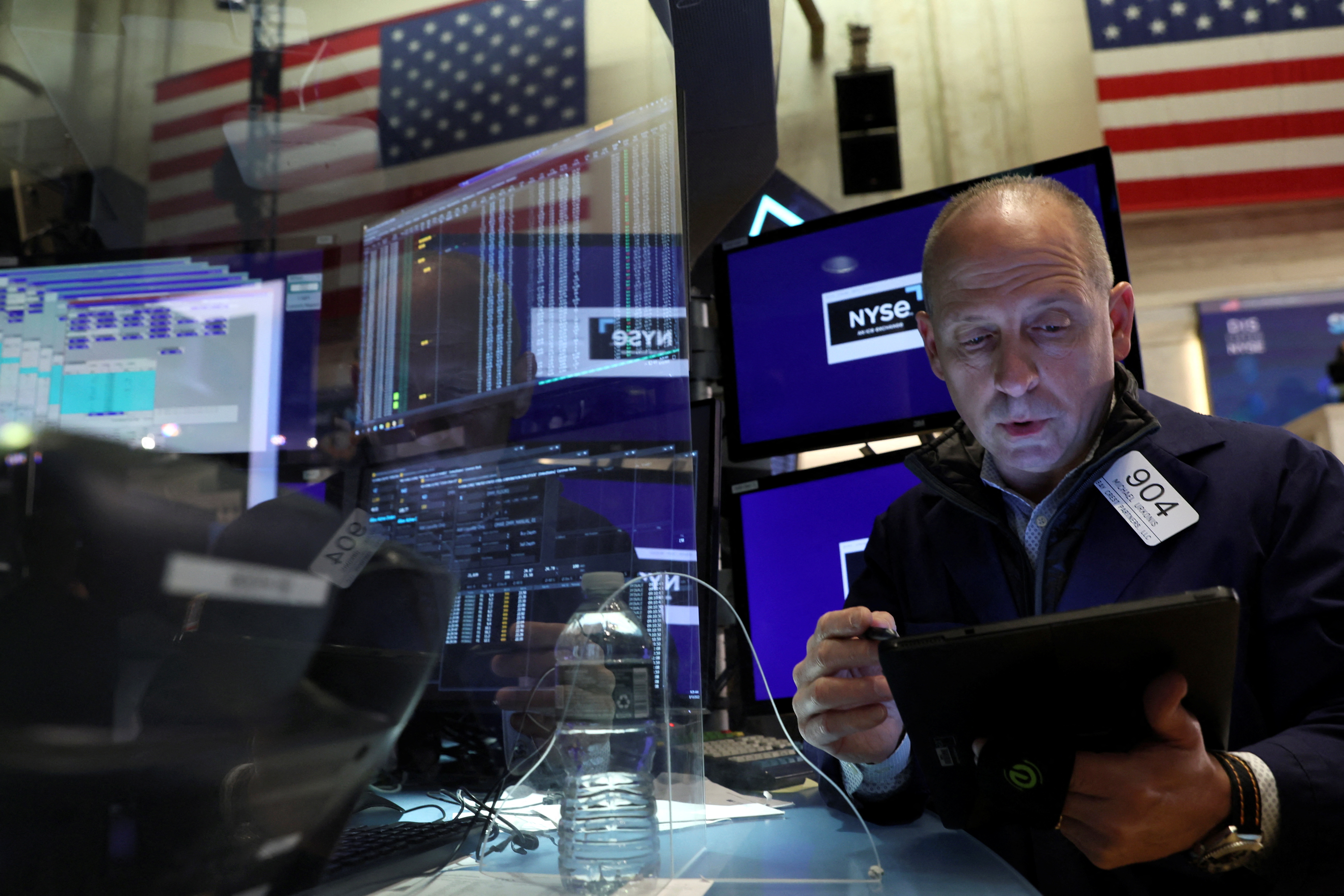 A trader works on the floor of the New York Stock Exchange in New York City, May 13, 2022.