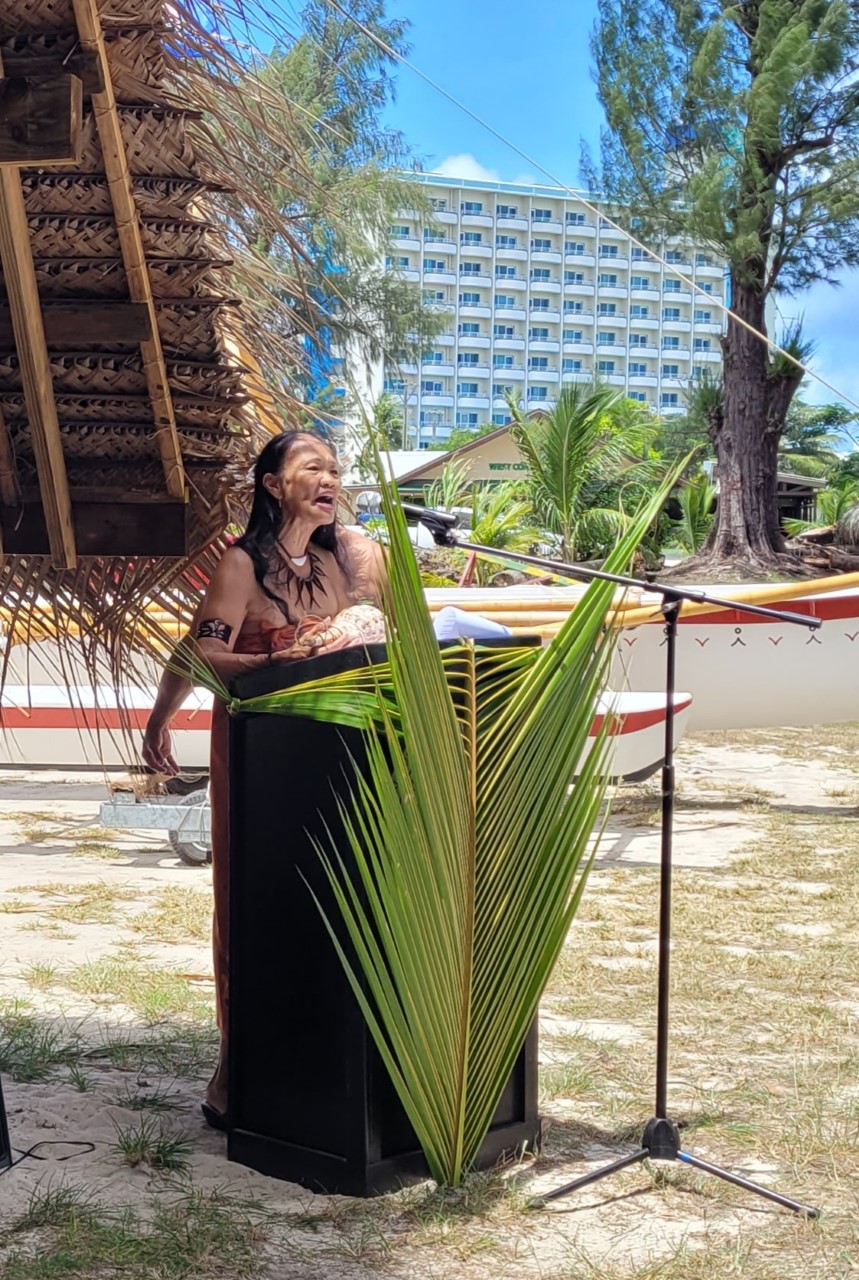 Cultural advocate Frances "Kai" Sablan recites a traditional chant.