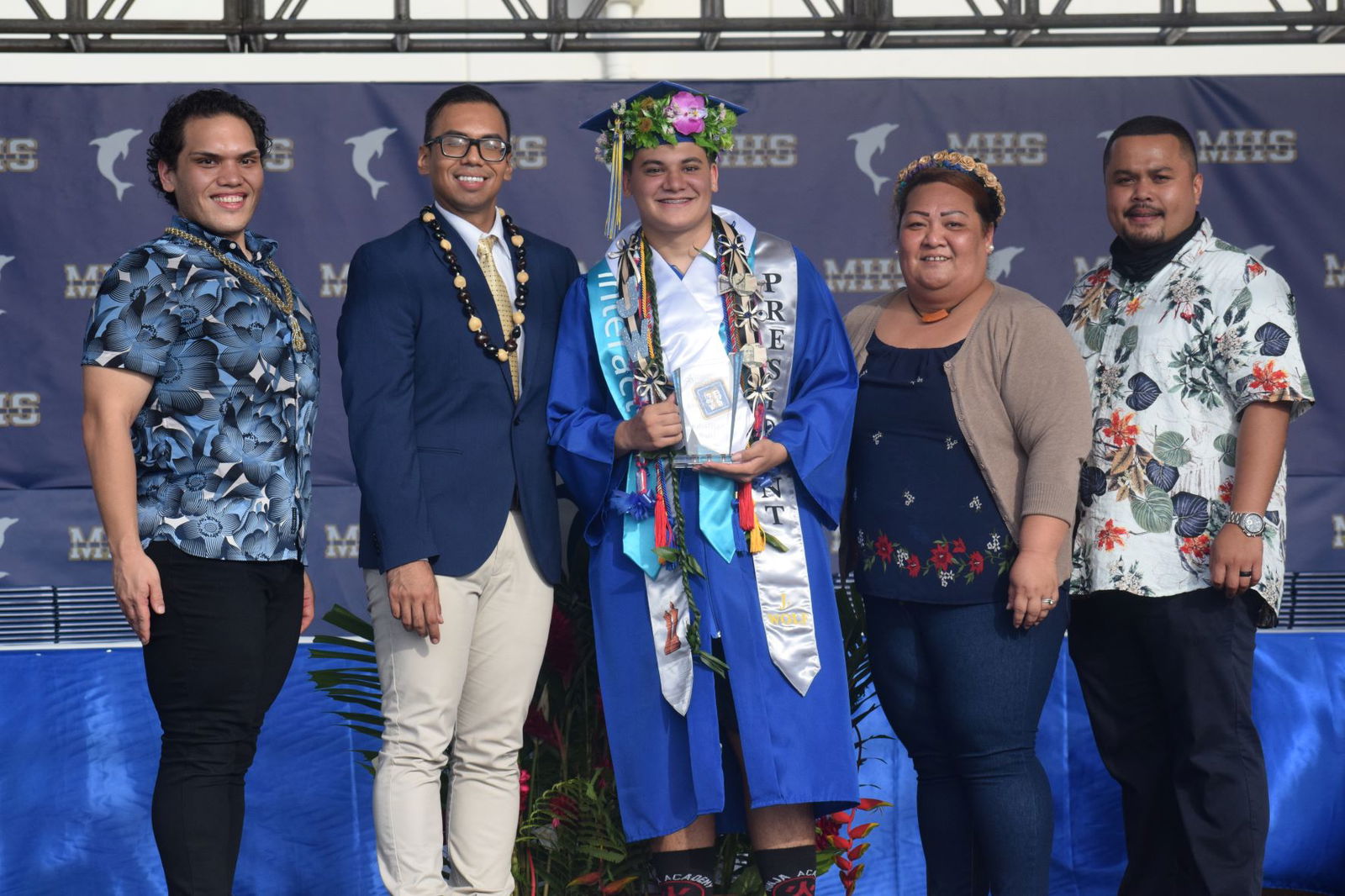 Premier Distinction awardee Jonathan Wolf, center, with MHS Principal Jonathan Aguon, second left, Vice Principals Romolo Orsini, left, Melanie Rdiall, second right, and Preston Basa, right.