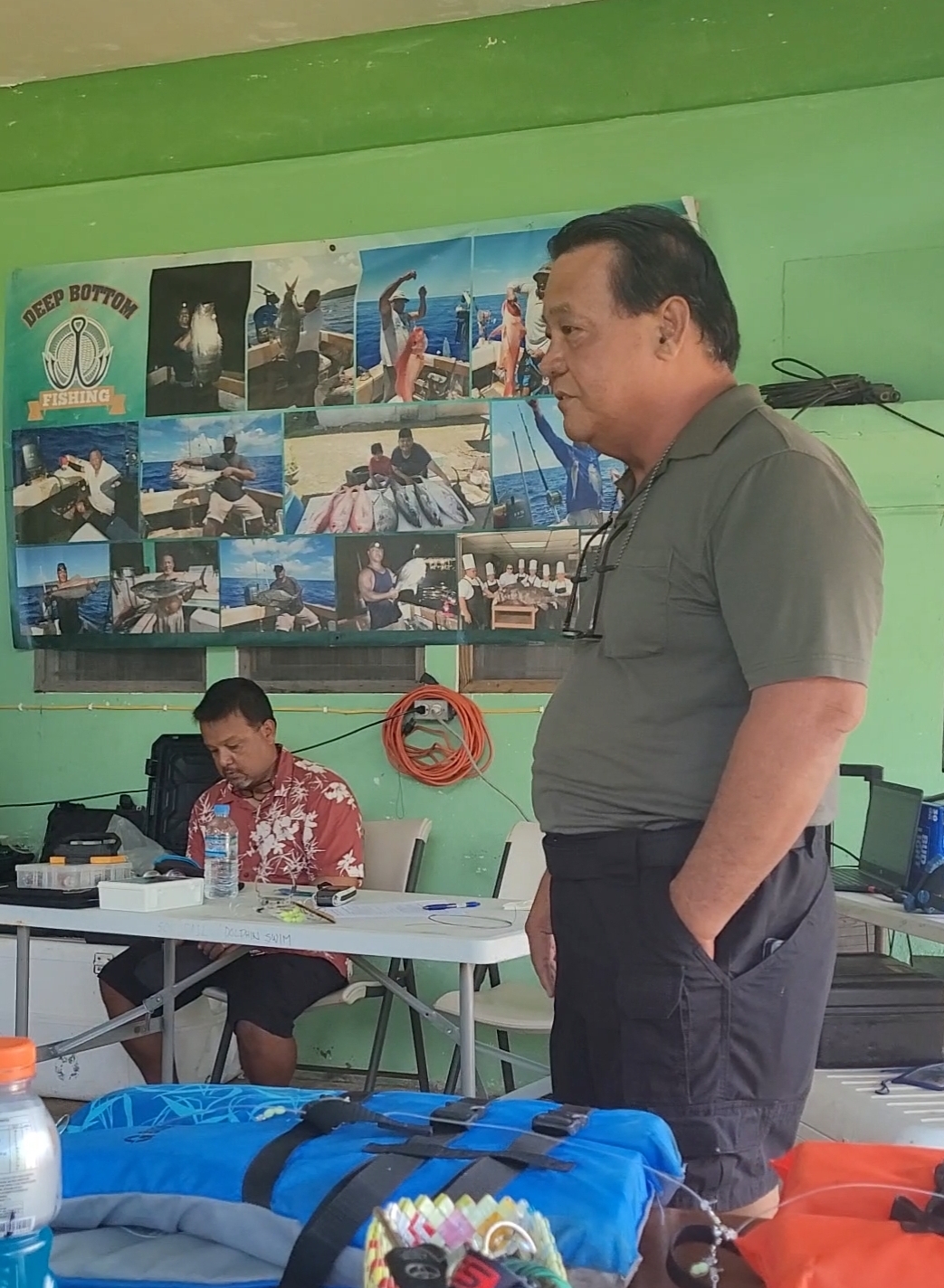 Ramon “RB” Camacho speaks to the bottom-fishing workshop participants in Dandan on Friday.
