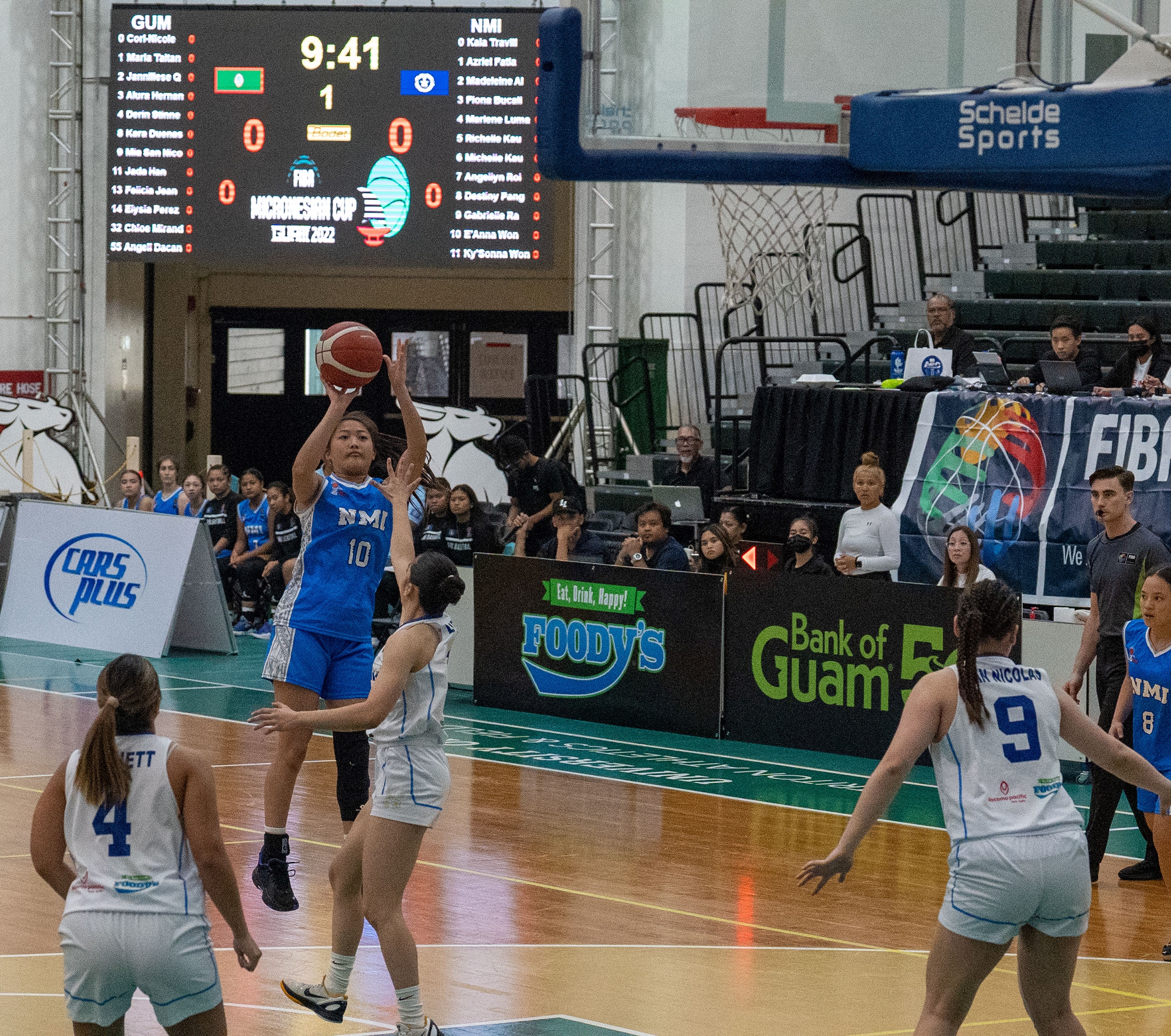 NMI Women's E'Anna Won pulls up for the three-point shot.