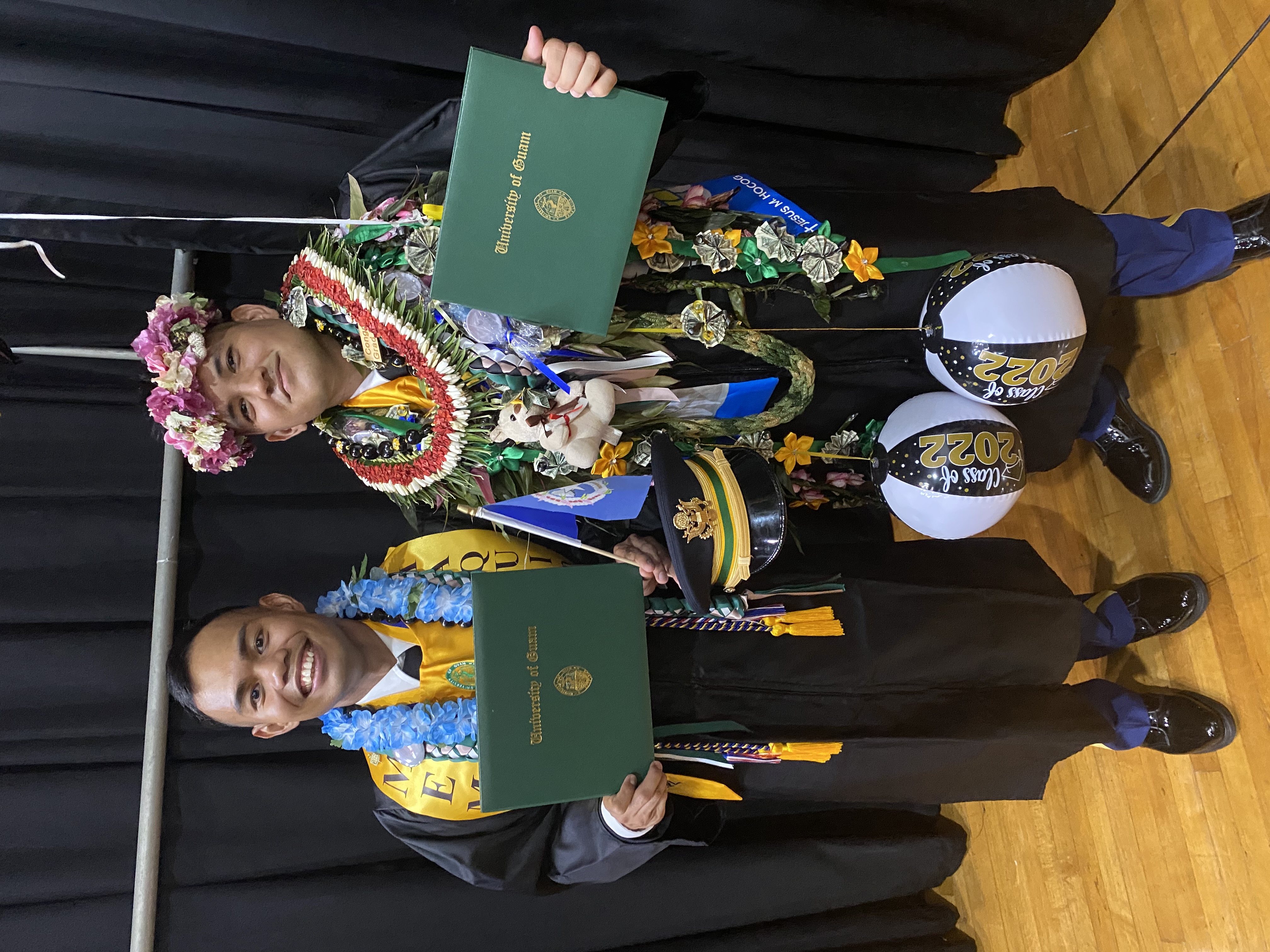 Second Lt. Dan Ryan Tumaquip  and 2nd Lt. Gavin Pangelinan graduated together from the University of Guam on May 22, 2022, a day after they commissioned as officers through the UOG ROTC program.