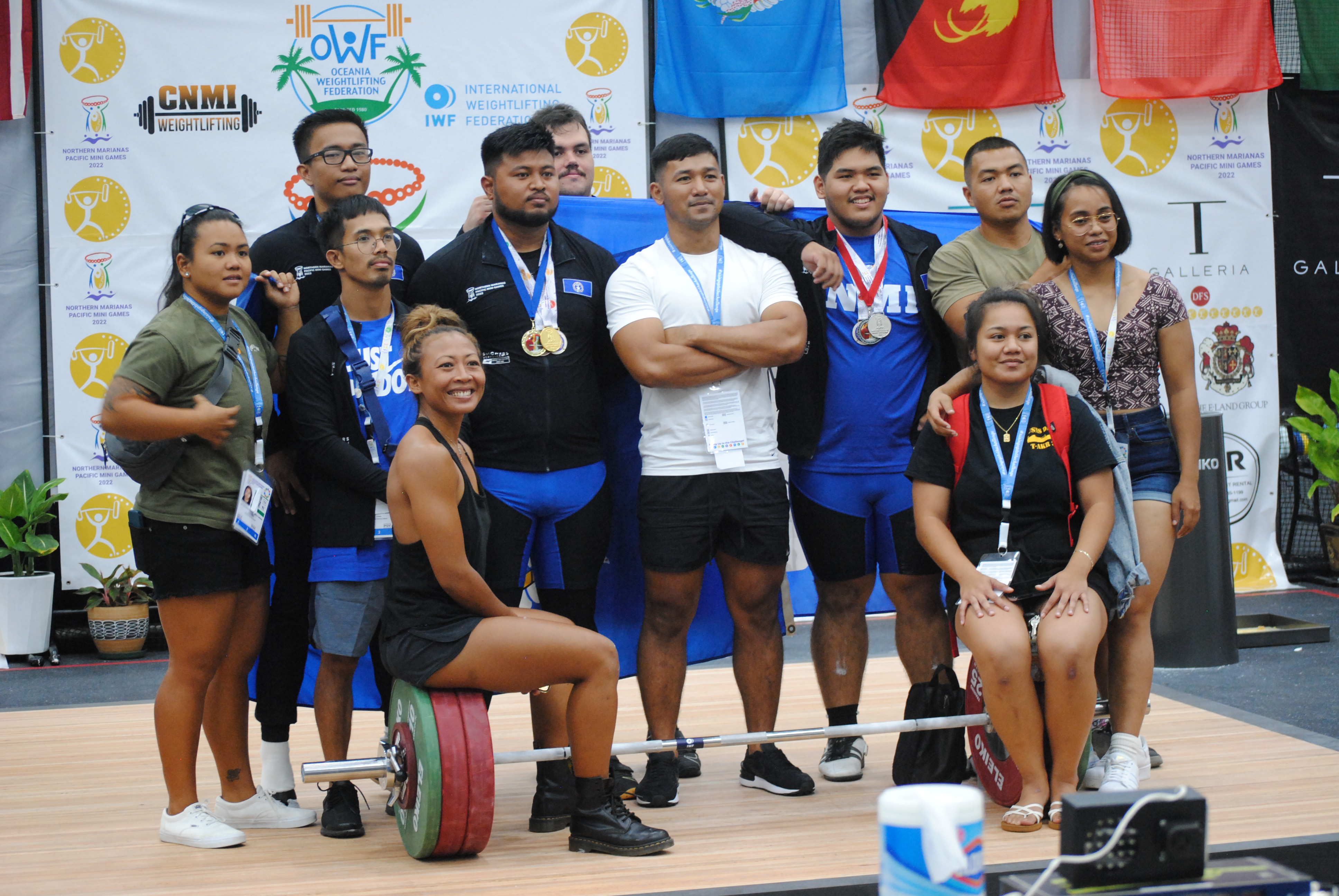 The NMI weightlifting team members pose for a photo after the conclusion of the competition.