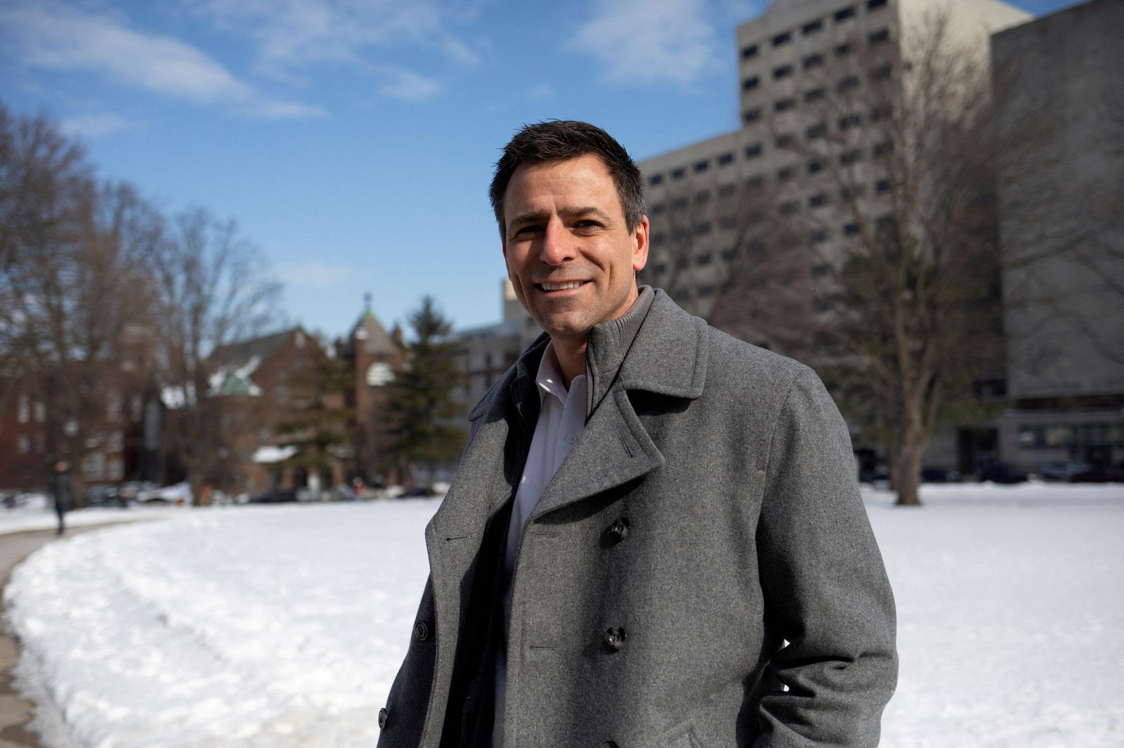 Michigan Republican gubernatorial candidate Ryan Kelley poses for a portrait as he joins supporters of former President Donald Trump gathering to demand for a forensic audit of the 2020 presidential election in front of the Michigan State Capitol in Lansing, Michigan, Feb. 8, 2022.