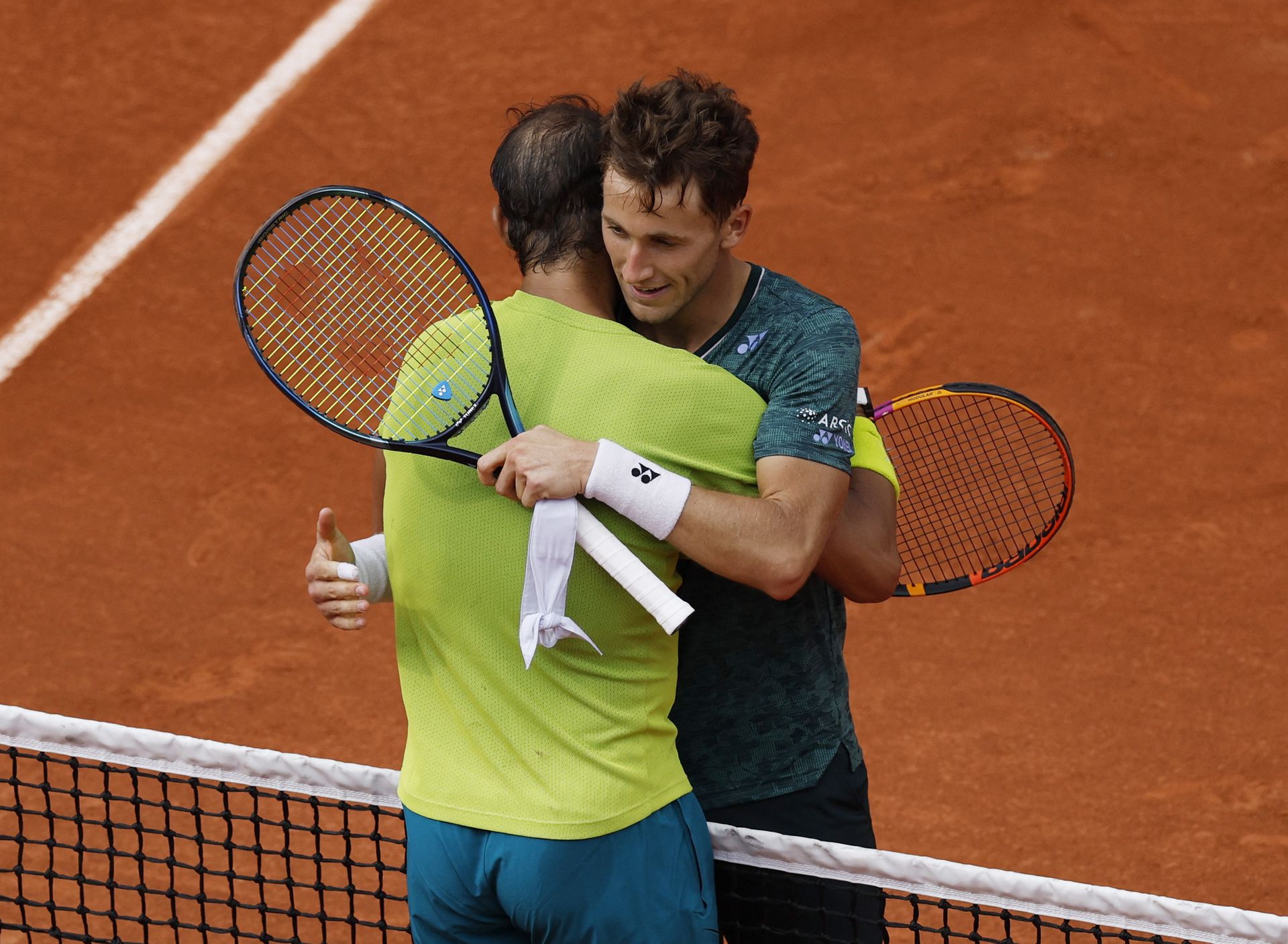 Spain's Rafael Nadal hugs Norway's Casper Ruud after winning the French Open men's singles final at Roland Garros, Paris, France on June 5, 2022.