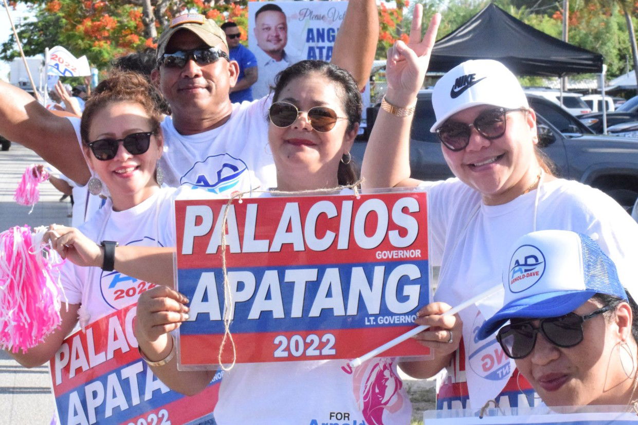 Former Office of Vocational Rehabilitation Director Maryann Borja and Rota independent House candidate Edward Barcinas with other AD 2022 supporters.