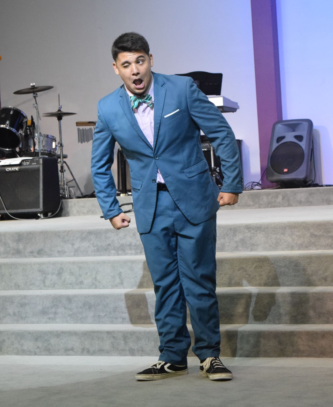 Marianas High School's Jonathan Wolf performs a humorous interpretation piece in the Grace Christian Academy auditorium on Tuesday.
