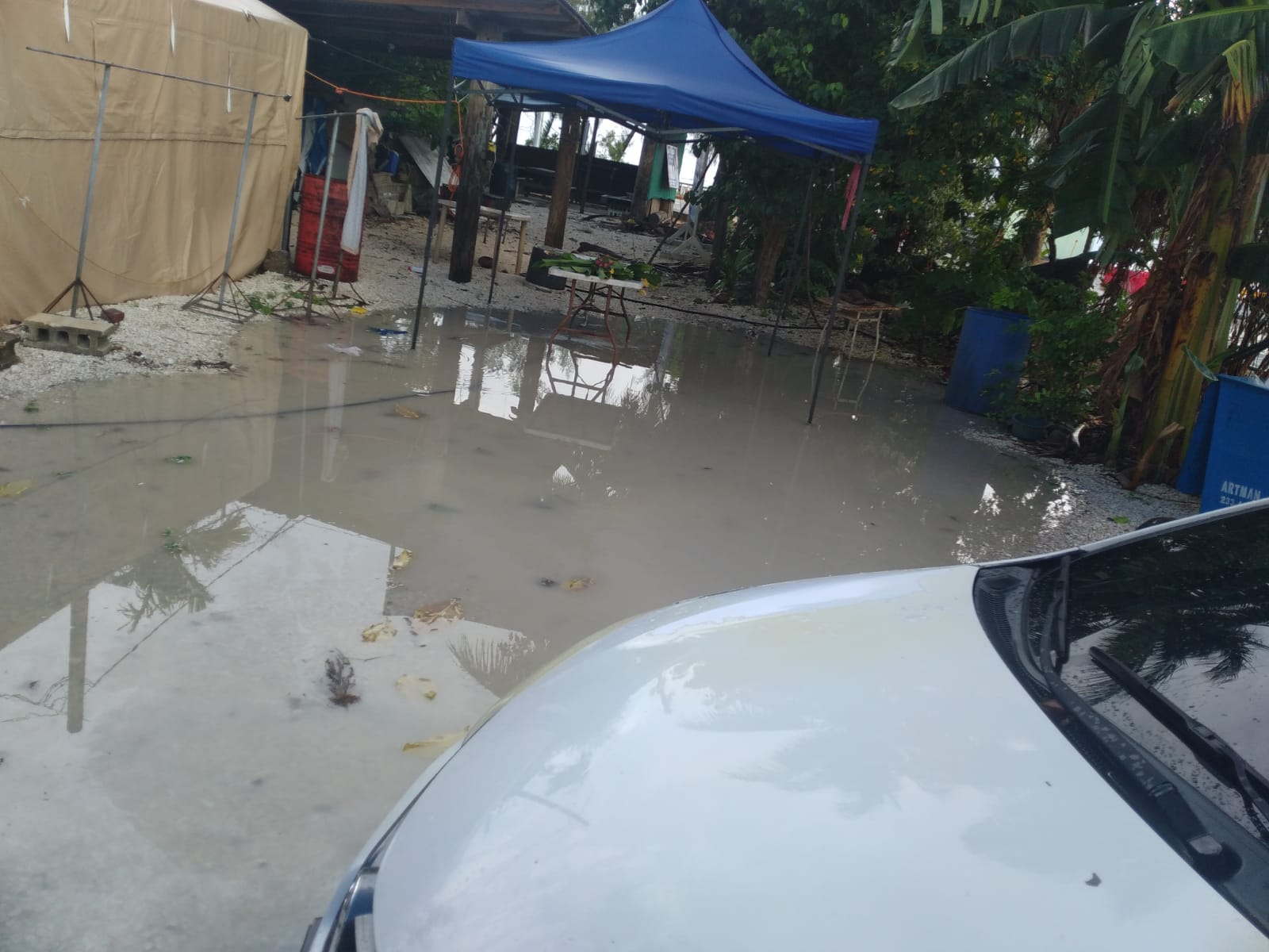 Runoff water that was supposed to go through box culverts at the corner of Beach Rd. and Quartermaster St. ended up on the property of Simeon Lisua after a downpour on Friday.